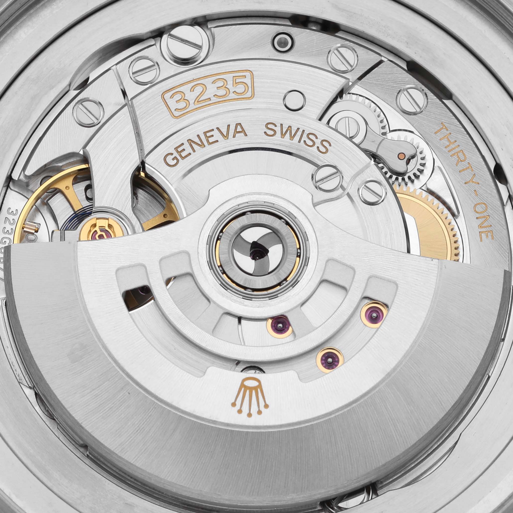 The image shows the movement mechanism of the Rolex Sea-Dweller 126660 Men's Stainless Steel Blue Dial 126660 Men's Stainless Steel Blue Dial watch from a top-down angle, highlighting components like gears and inscriptions.