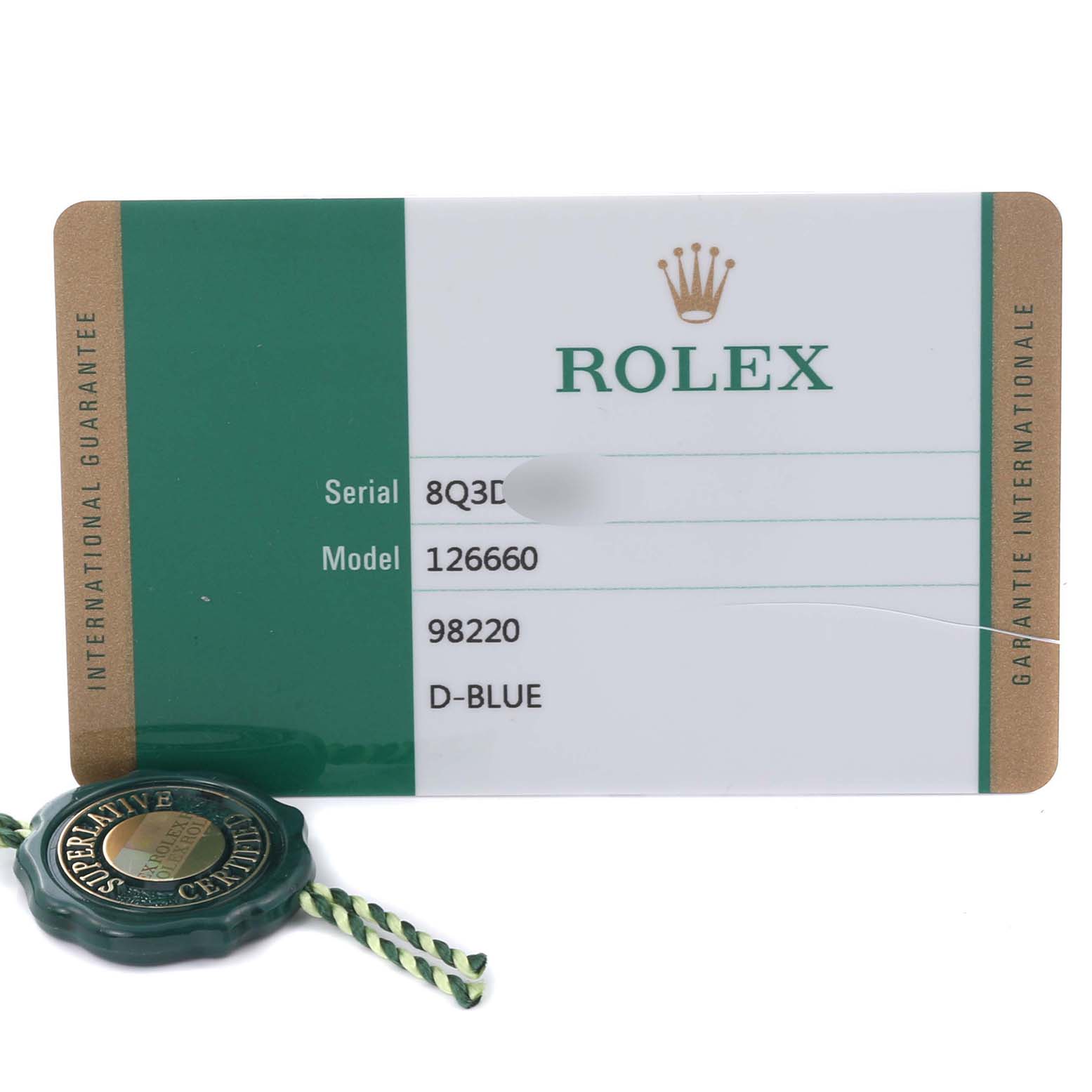 The image shows a Rolex Sea-Dweller 126660 Men's Stainless Steel Blue Dial 126660 Men's Stainless Steel Blue Dial model 126660 warranty card and a green certification tag.
