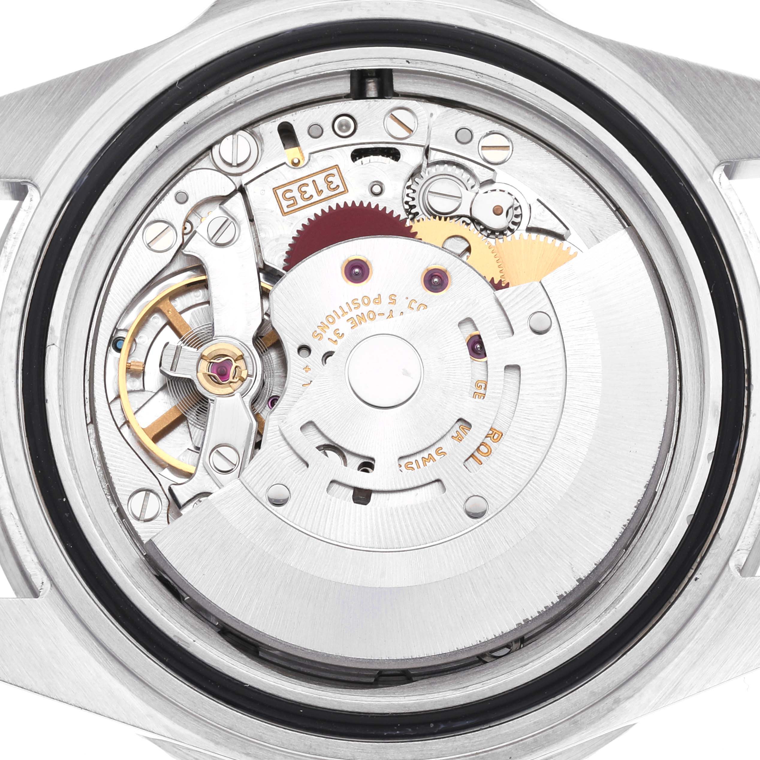 The image shows the internal mechanical movement of a Rolex Submariner 16610 Men
s Stainless Steel Black Dial 16610 Men
s Stainless Steel Black Dial watch, viewed from the back.