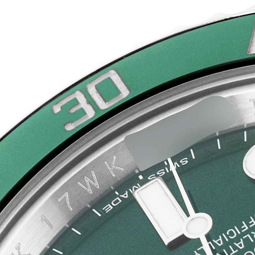 This image shows a close-up of the bezel and partial dial of the Rolex Submariner 116610LV Men
s Stainless Steel Green Dial 116610LV Men
s Stainless Steel Green Dial watch, focusing on the "30" minute mark.