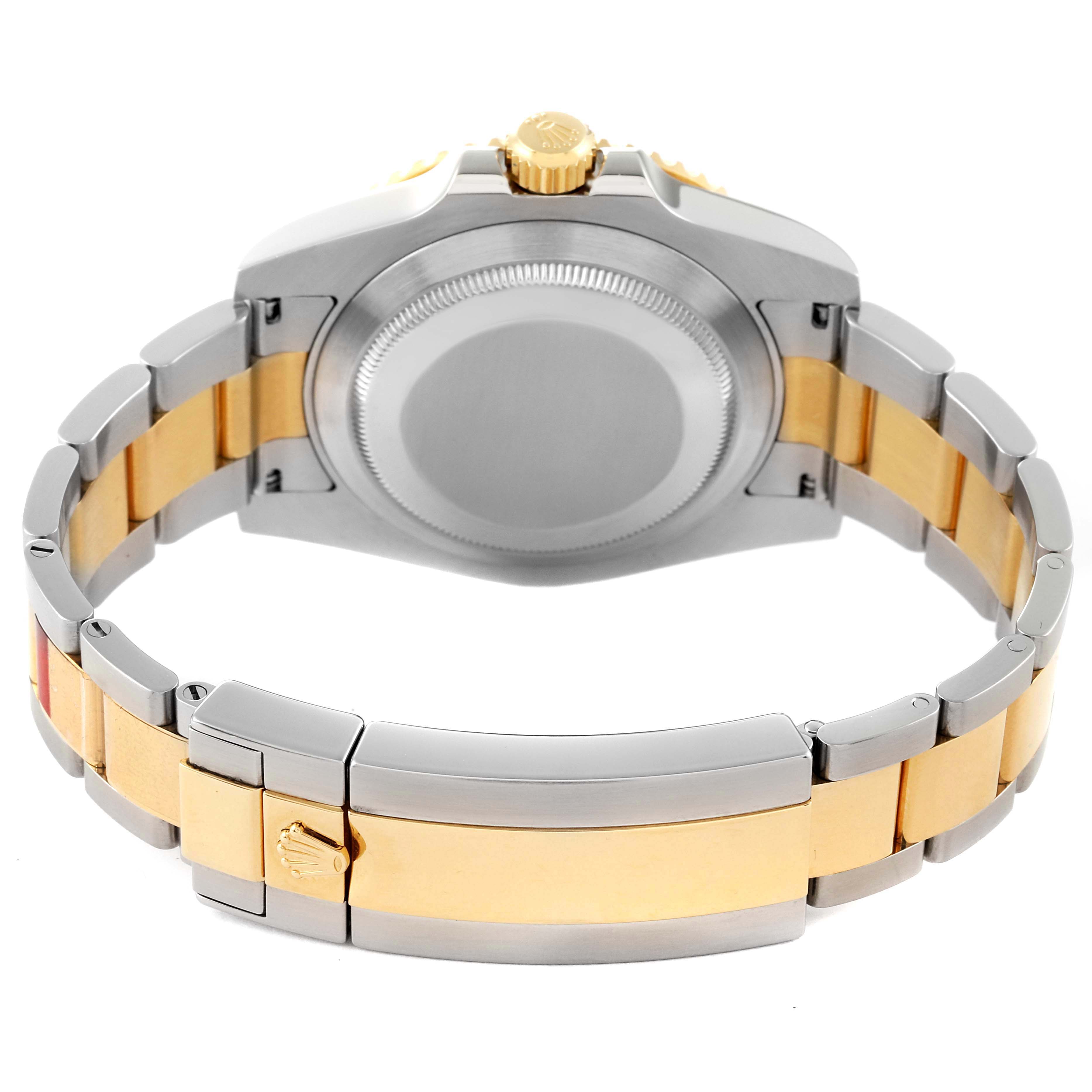 The image shows the back view and bracelet of the Rolex Submariner 116613 Men's Steel and Gold (two tone) Blue Dial 116613 Men's Steel and Gold (two tone) Blue Dial watch, featuring a stainless steel and gold two-tone design.