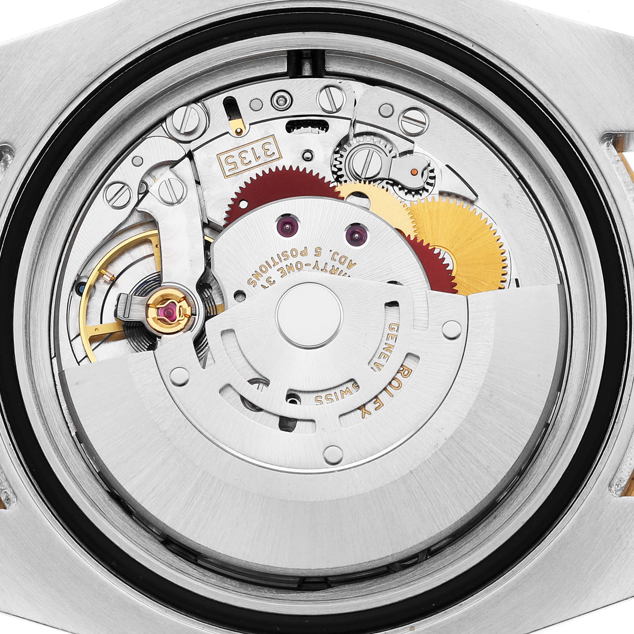 The image shows a close-up view of the movement and internal mechanism of a Rolex Submariner 116613 Men's Steel and Gold (two tone) Blue Dial 116613 Men's Steel and Gold (two tone) Blue Dial watch.