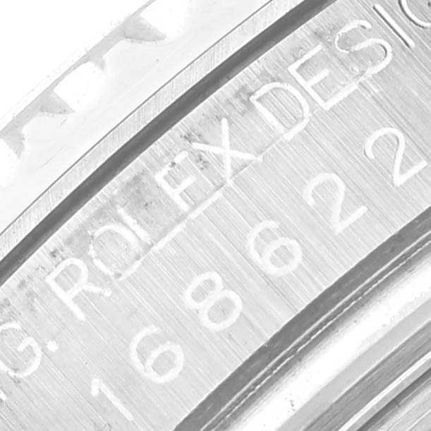 The image shows a close-up angle of the Rolex Yacht-Master 168622 Men's Stainless Steel Silver Dial 168622 Men's Stainless Steel Silver Dial's engraved inner bezel with model details.