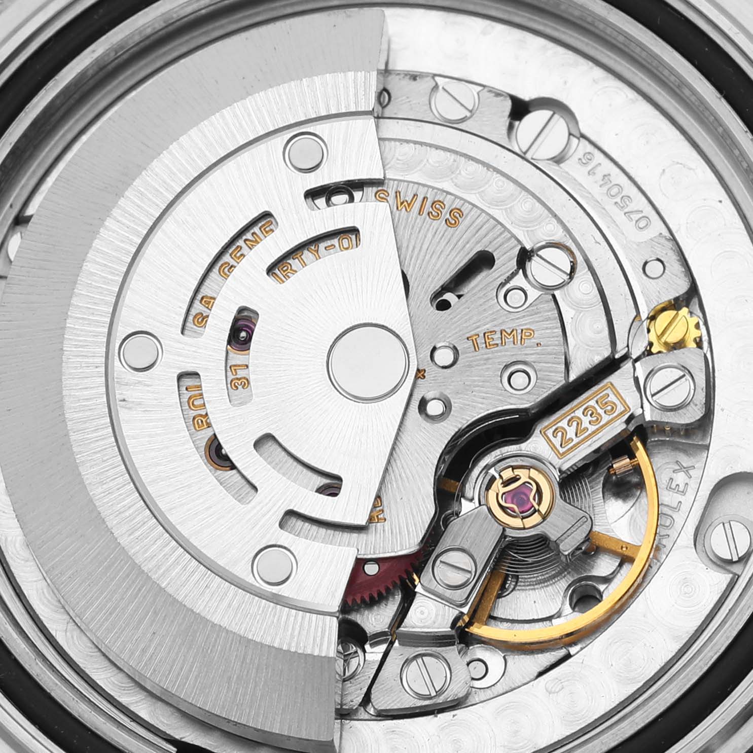 The image shows an internal view of the Rolex Yacht-Master 168622 Men's Stainless Steel Silver Dial 168622 Men's Stainless Steel Silver Dial watch mechanism, highlighting gears and movement parts.