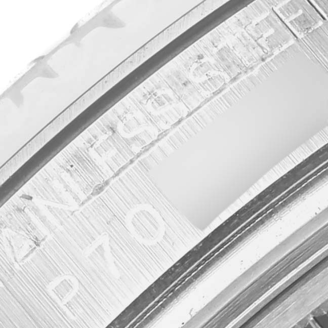 The image shows a close-up of the engraved edge detail on a Rolex Yacht-Master 168622 Men's Stainless Steel Silver Dial 168622 Men's Stainless Steel Silver Dial watch.