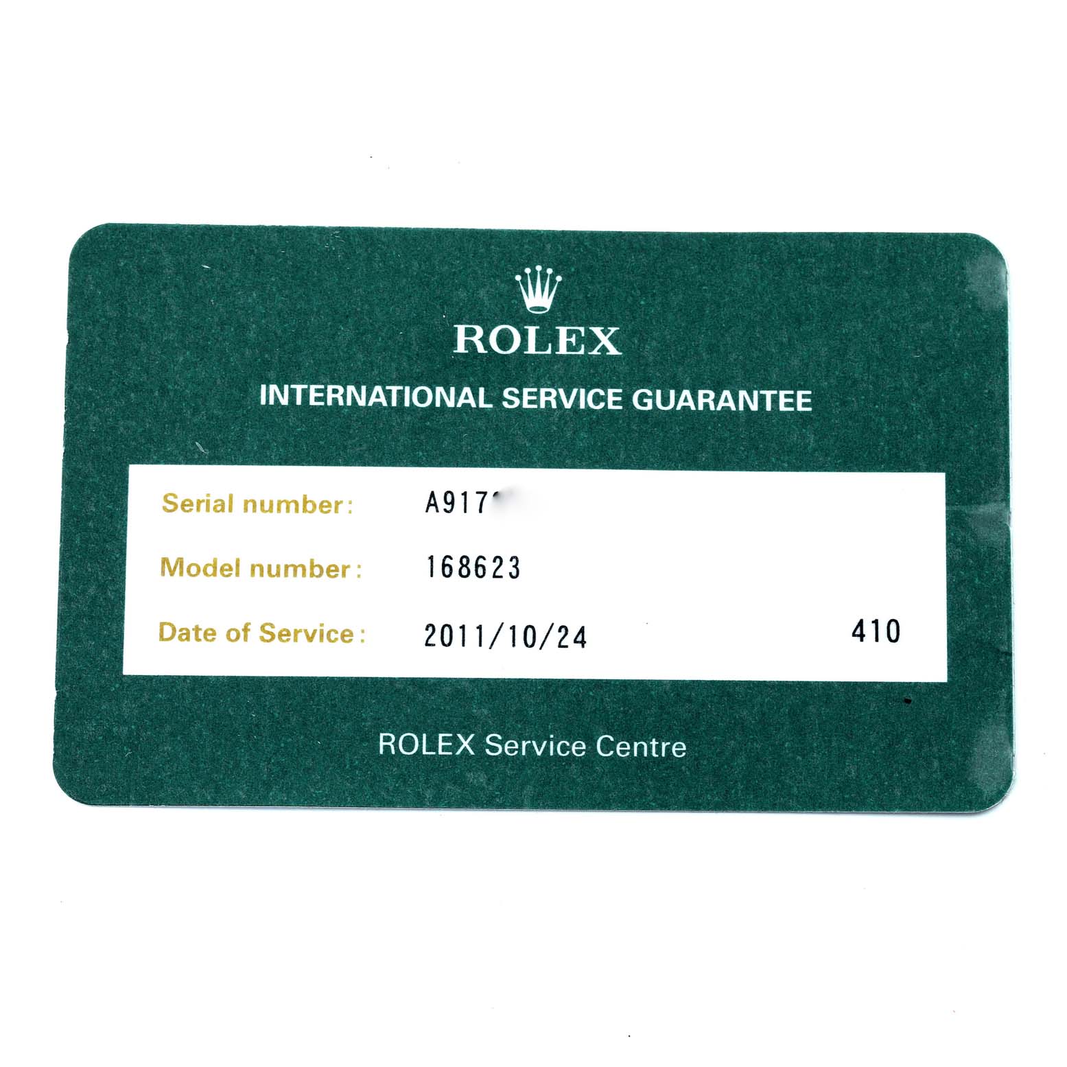 This image shows a Rolex service guarantee card for the Yacht-Master model, detailing serial and model numbers along with the service date.