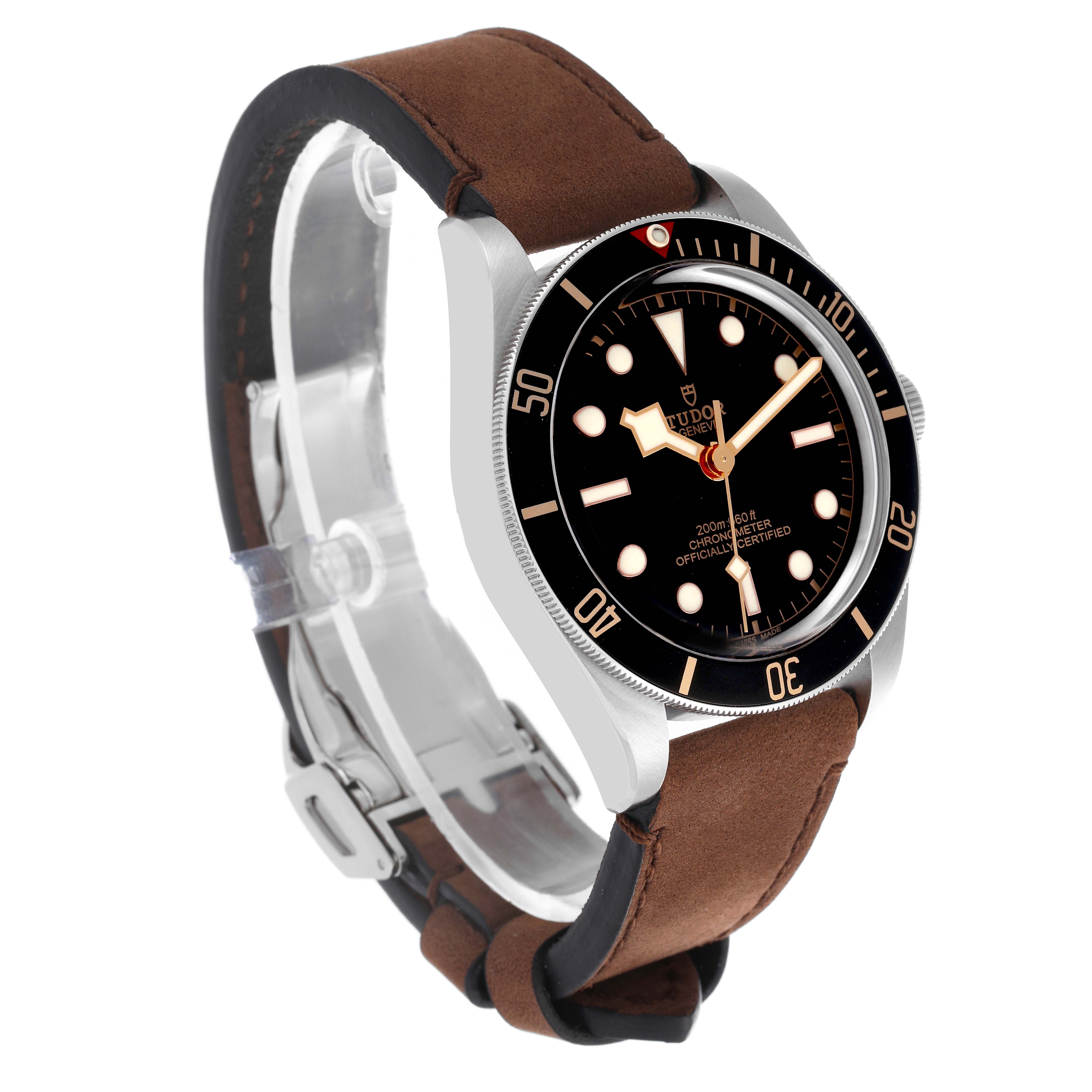 The Tudor Heritage Black Bay 79030N-0002 Men's Stainless Steel Black Dial 79030N-0002 Men's Stainless Steel Black Dial watch is shown from a front-side angle, displaying its dial, bezel, and brown strap.