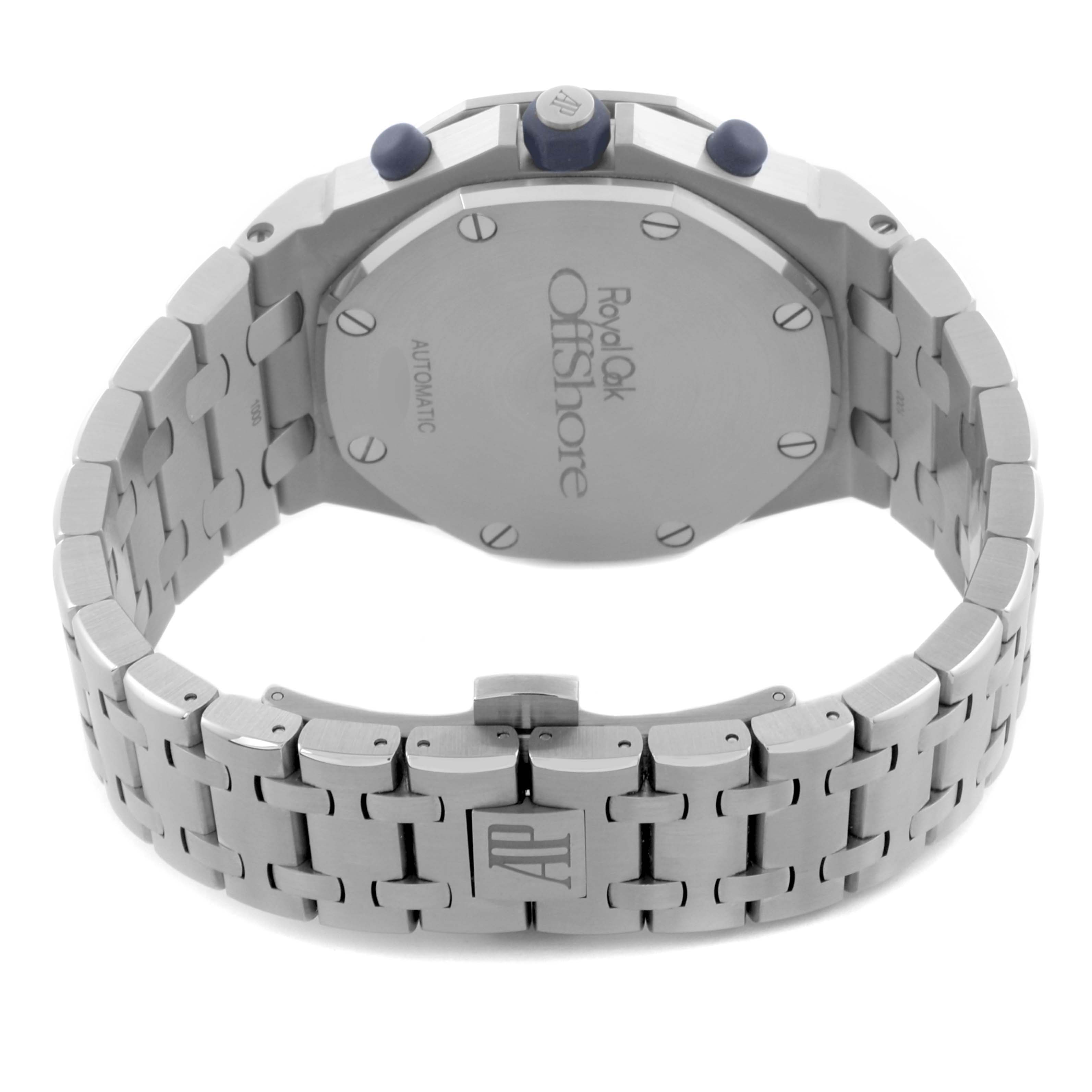 The watch is shown from the back, displaying the case back and part of the bracelet with the AP logo on the clasp.