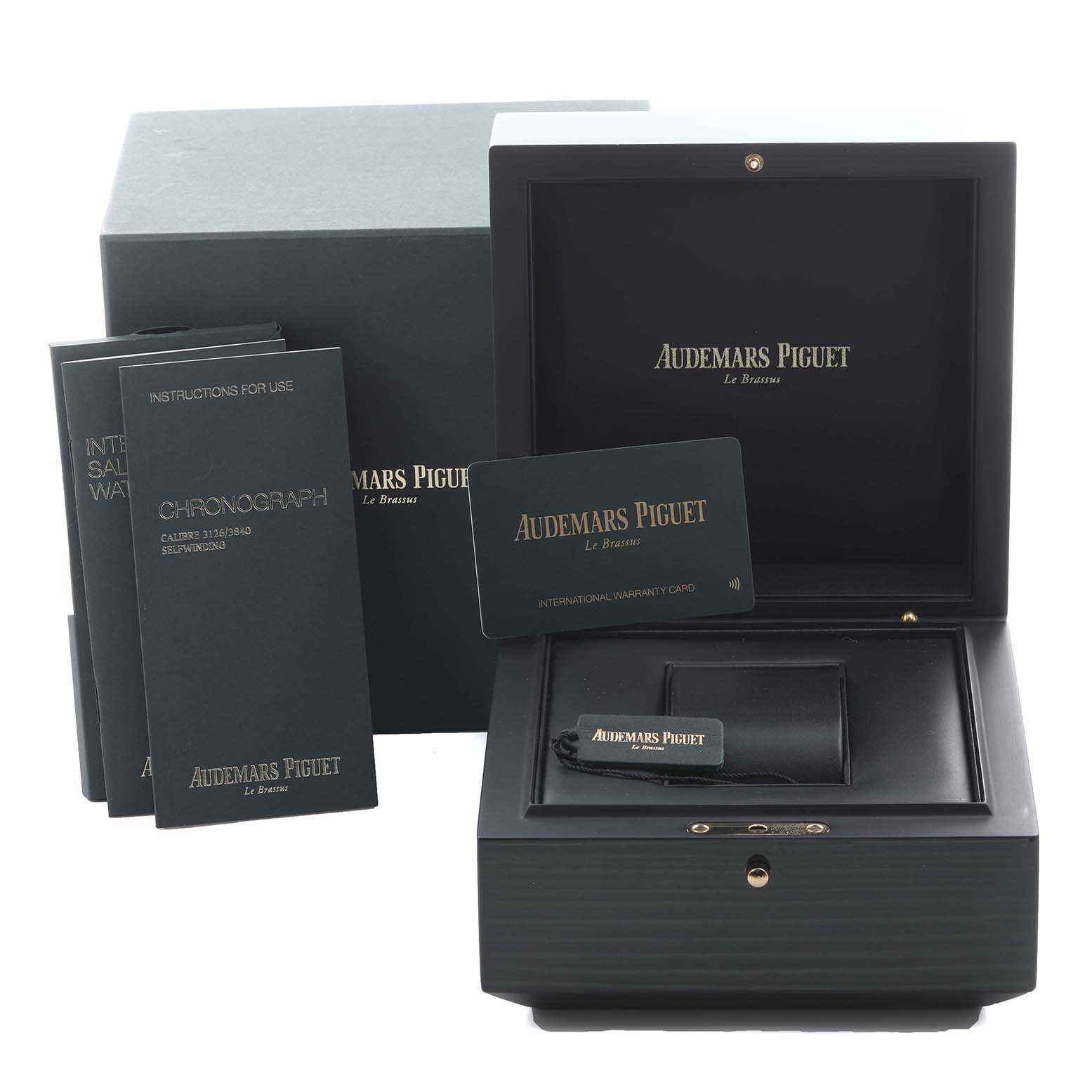 The image shows the packaging for the Audemars Piguet Royal Oak Offshore 26237ST.OO.1000ST.01.A Men's Stainless Steel Blue Dial 26237ST.OO.1000ST.01.A Men's Stainless Steel Blue Dial model, including the box, manuals, and warranty card.