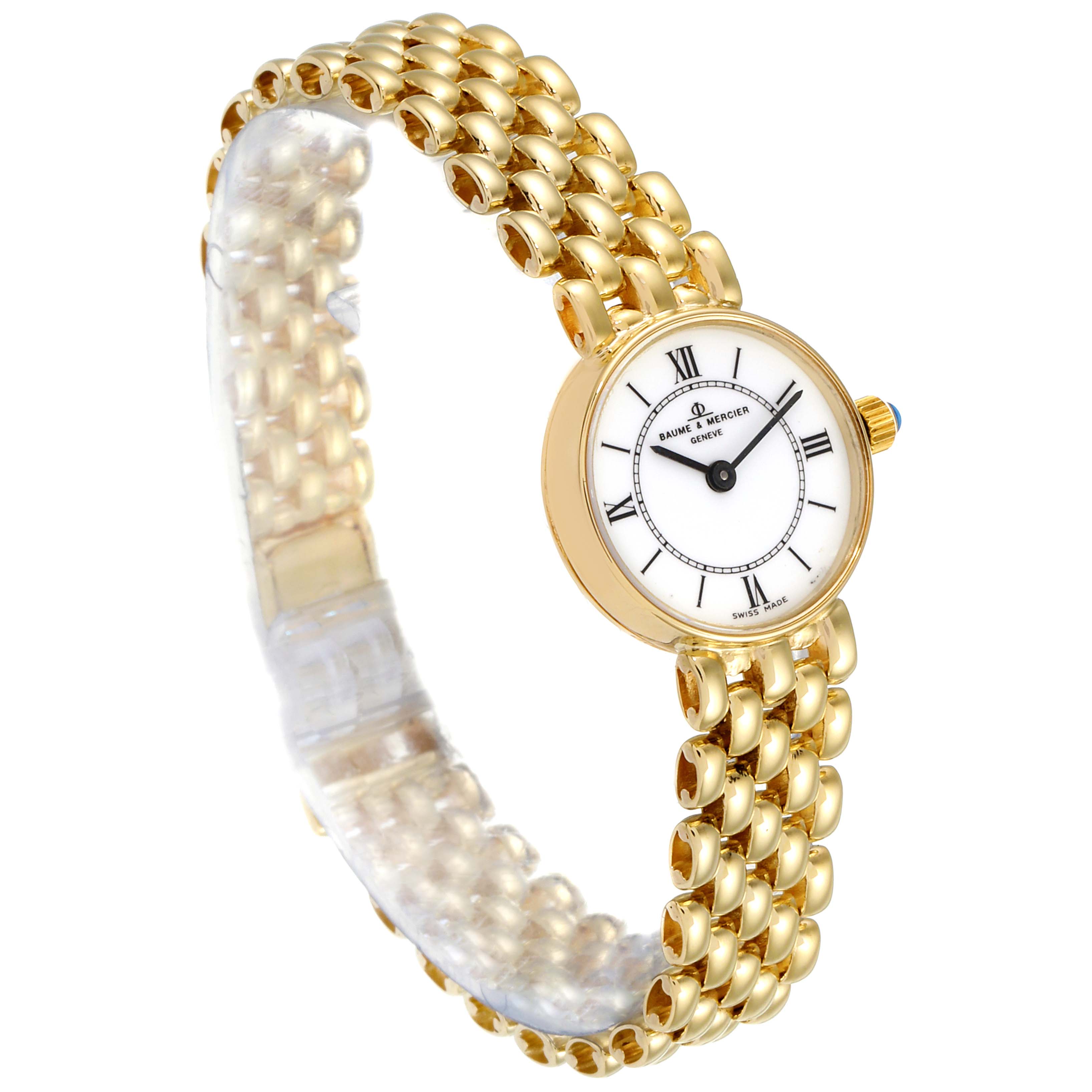 The image shows a Baume & Mercier  Women's Yellow Gold White Dial  Women's Yellow Gold White Dial 14k Yellow Gold White Dial Cocktail Ladies Watch from a front angle, highlighting the dial and bracelet.