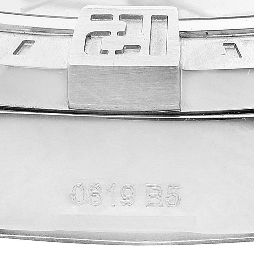 Close-up of the Breitling Avenger A32390 Men's Stainless Steel Mother of Pearl Dial A32390 Men's Stainless Steel Mother of Pearl Dial watch bezel and part of the case, showing a serial number.