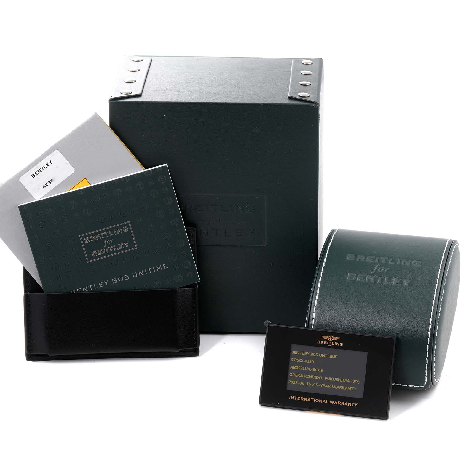 The image shows the packaging, manuals, and international warranty card for a Breitling Bentley AB0521U4/BC65 Men's Stainless Steel Black Dial AB0521U4/BC65 Men's Stainless Steel Black Dial model watch.