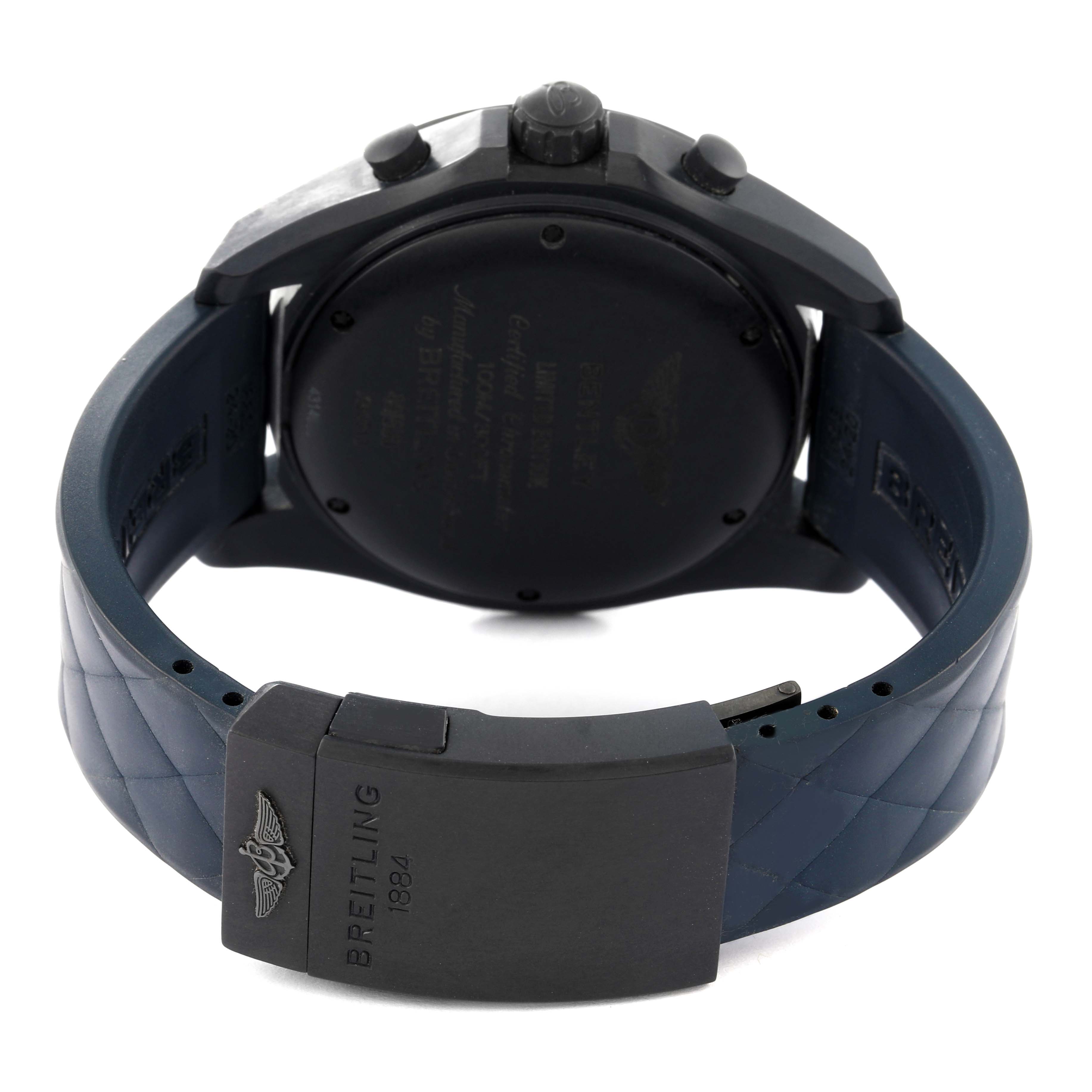 The image shows the backside of a Bentley model Breitling watch, focusing on the clasp, strap, and case back.