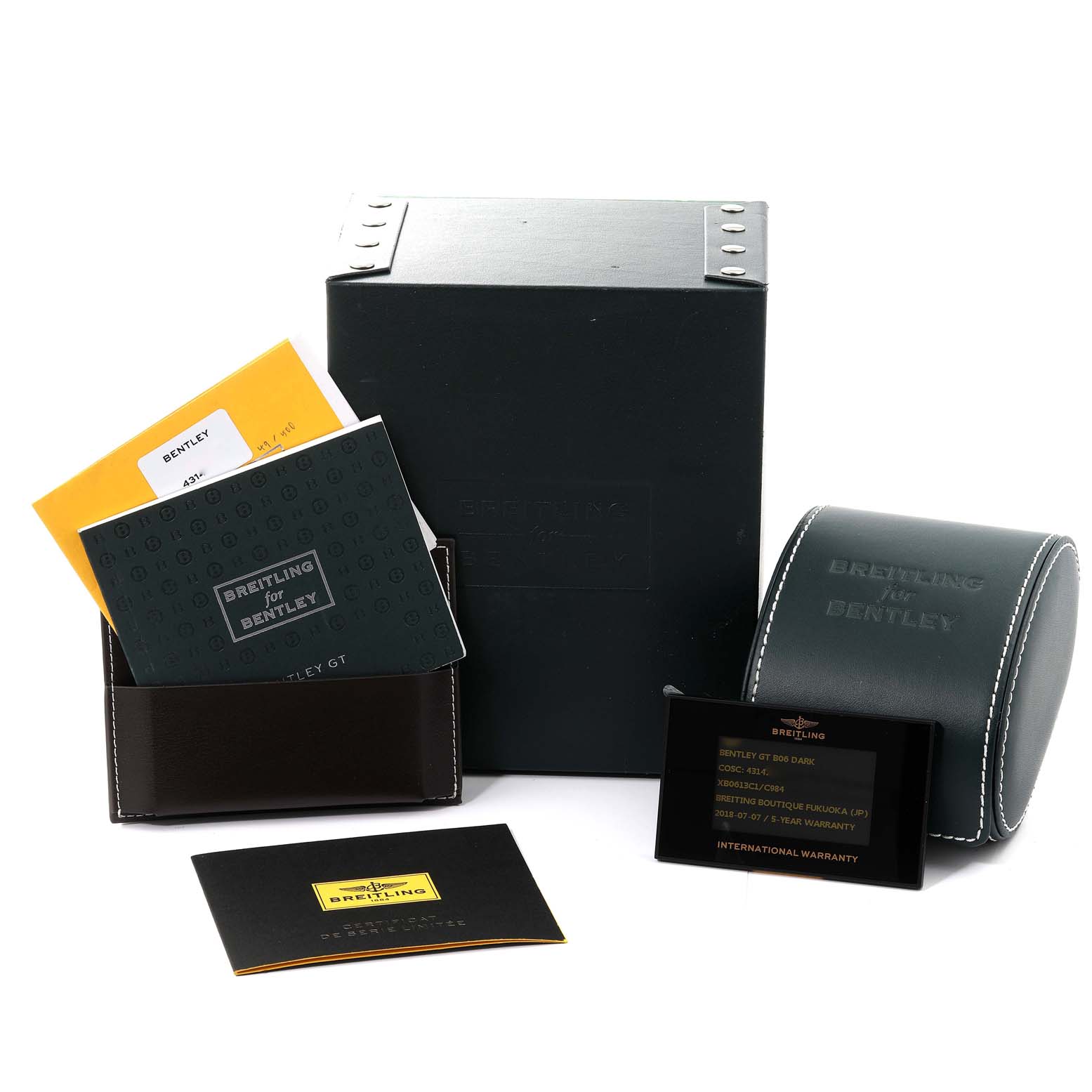 The image shows the Breitling Bentley XB0613 Men's Ceramic Blue Dial XB0613 Men's Ceramic Blue Dial watch box, manuals, warranty card, and a leather case from a front angle.