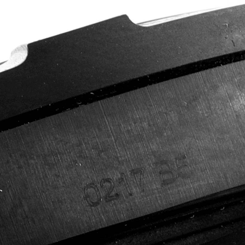 The image shows a close-up of the side of a Breitling Professional Series V73330 Men
s Titanium Blue Dial V73330 Men
s Titanium Blue Dial watch with the number "0217 35" engraved.