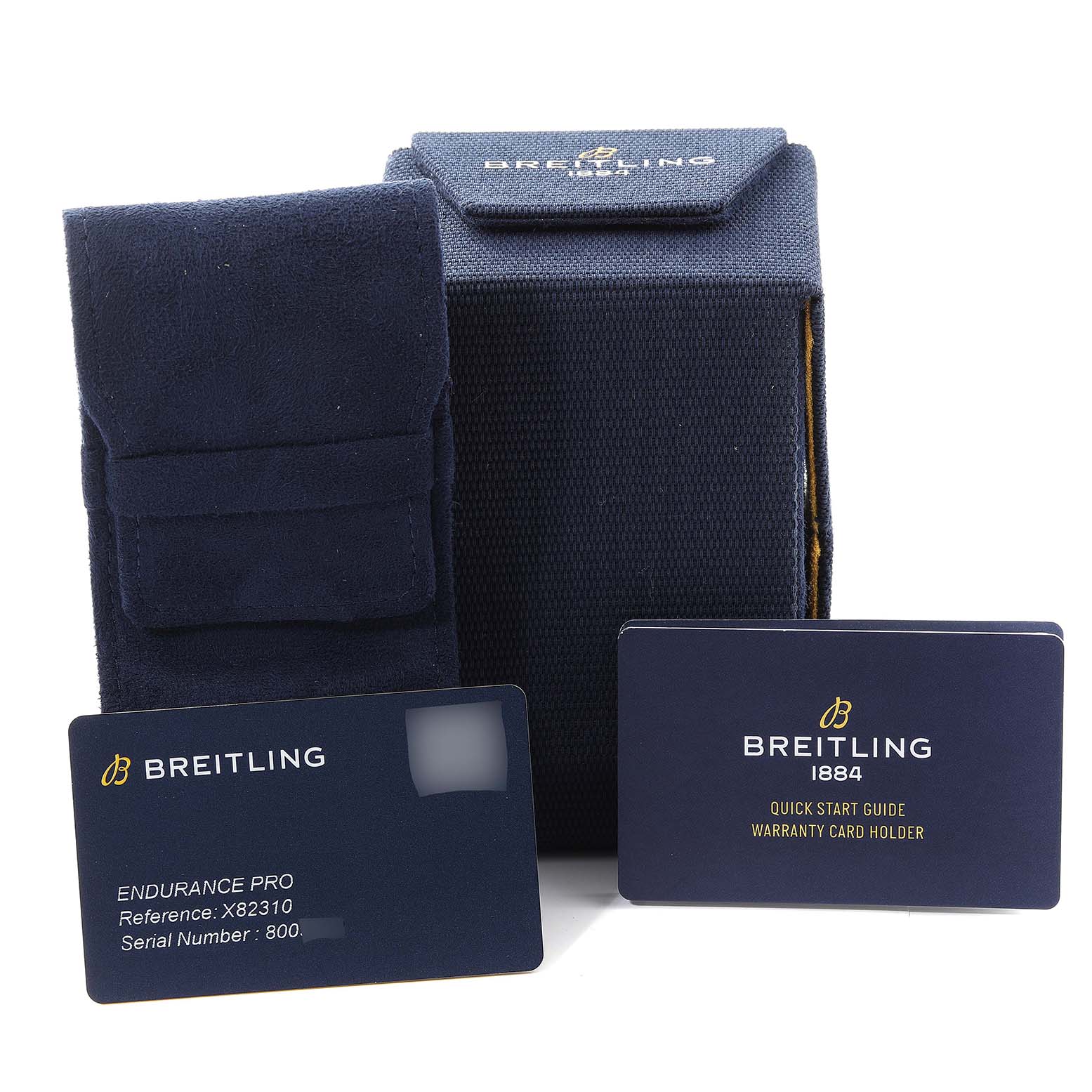 The image shows a Breitling Professional Series X82310 Men's Ceramic Black Dial X82310 Men's Ceramic Black Dial watch package, including a carrying case, warranty card, and quick start guide.