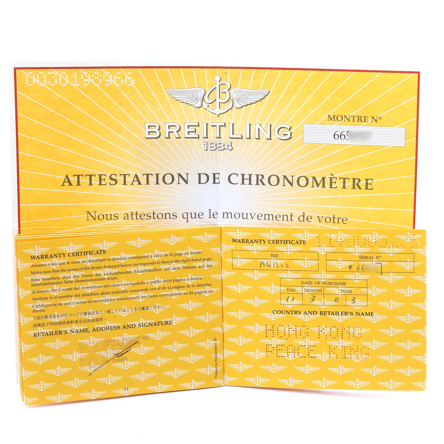 The image shows the warranty certificates and chronometer attestation document for a Breitling Navitimer A41322 Men
s Stainless Steel Black Dial A41322 Men
s Stainless Steel Black Dial watch.