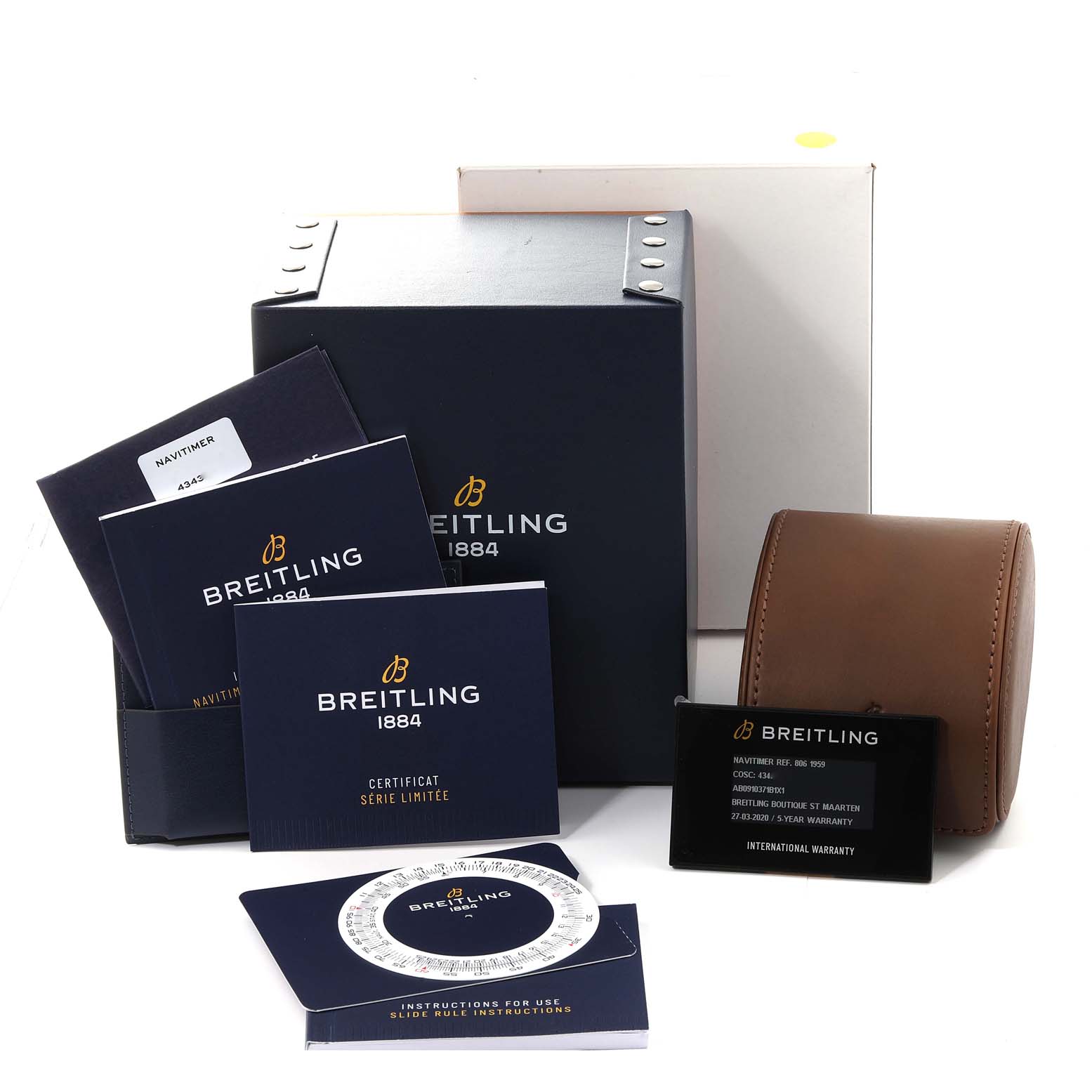 The image shows the packaging and accessories of a Breitling Navitimer AB0910371B1X1 Men's Stainless Steel Black Dial AB0910371B1X1 Men's Stainless Steel Black Dial watch, including booklets, warranty card, and watch case.