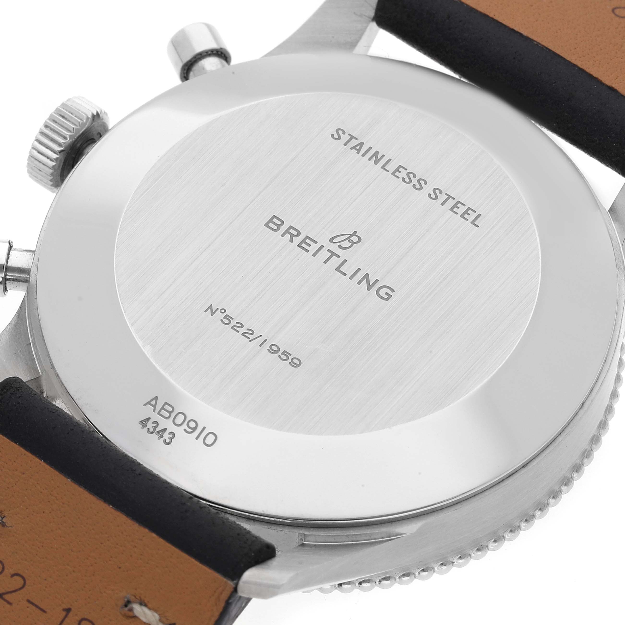 The image shows the back case of a Breitling Navitimer AB0910371B1X1 Men's Stainless Steel Black Dial AB0910371B1X1 Men's Stainless Steel Black Dial watch, displaying the model and brand engravings.