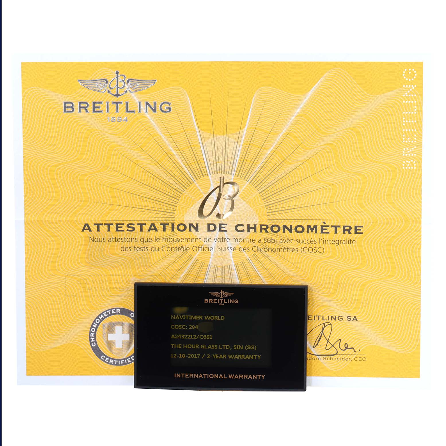 The image shows the certification and international warranty cards for the Breitling Navitimer A24322 Men
s Stainless Steel Blue Dial A24322 Men
s Stainless Steel Blue Dial model.