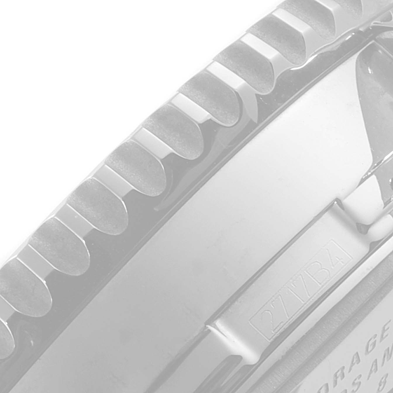 The image shows a close-up of the bezel and part of the side case of a Breitling Navitimer A24322 Men
s Stainless Steel Blue Dial A24322 Men
s Stainless Steel Blue Dial watch.