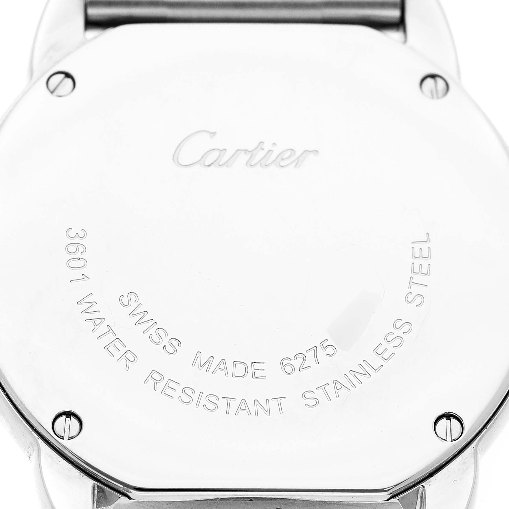 The image shows the back case of a Cartier Ronde W6701004 Women's Stainless Steel Silver Dial watch, engraved with branding and specifications.