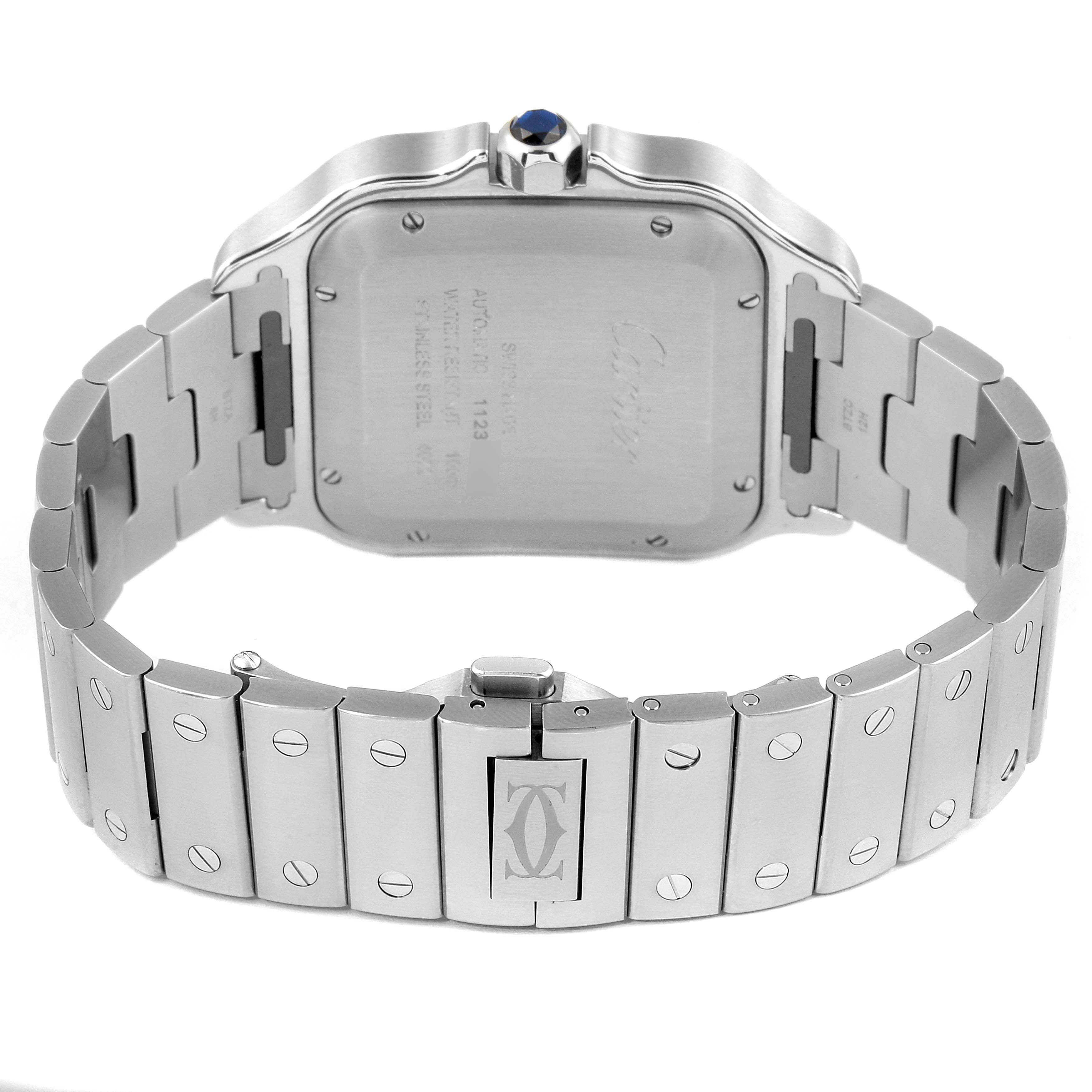 This image shows the back case and bracelet of the Cartier Santos WSSA0013 Men's Stainless Steel Blue Dial WSSA0013 Men's Stainless Steel Blue Dial watch, including the clasp and the crown with a blue gemstone.