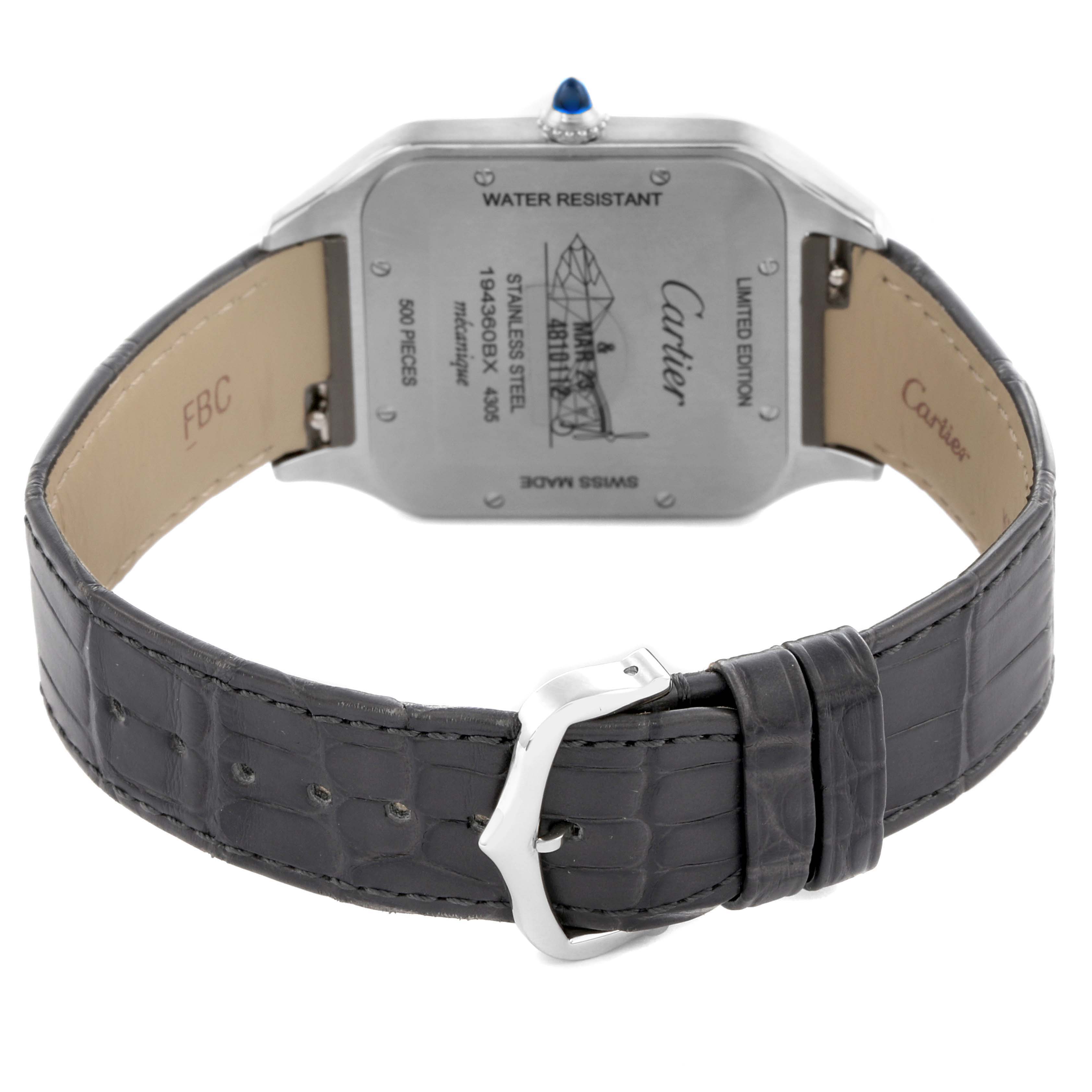 The image shows the Cartier Santos Dumont W2SA0025 Men
s Steel and Gold (two tone) Pink Dial W2SA0025 Men
s Steel and Gold (two tone) Pink Dial watch from the back, highlighting the clasp, leather strap, and engraved caseback.