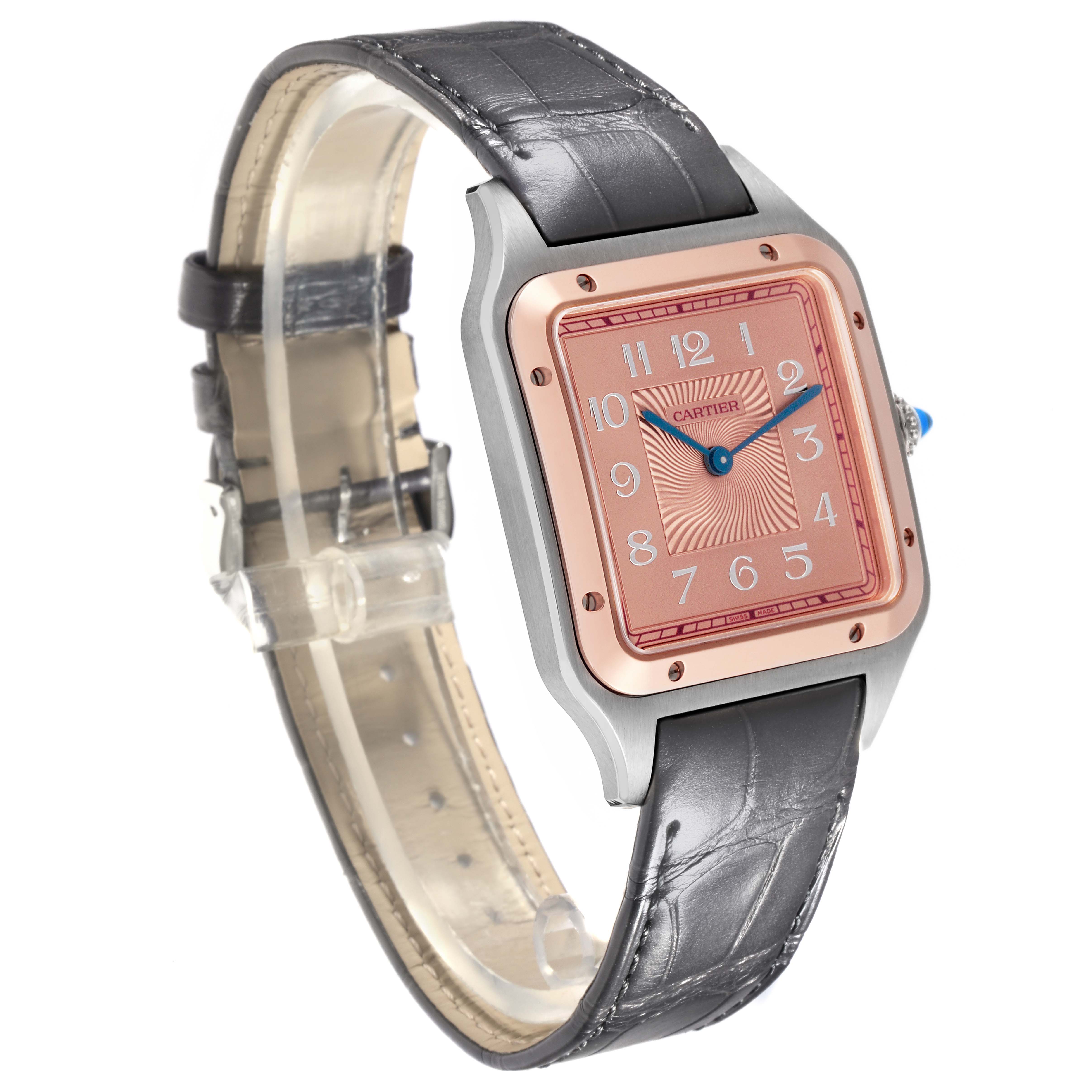 The Cartier Santos Dumont W2SA0025 Men
s Steel and Gold (two tone) Pink Dial W2SA0025 Men
s Steel and Gold (two tone) Pink Dial watch is shown at a three-quarter angle, highlighting the face, case, and leather strap.