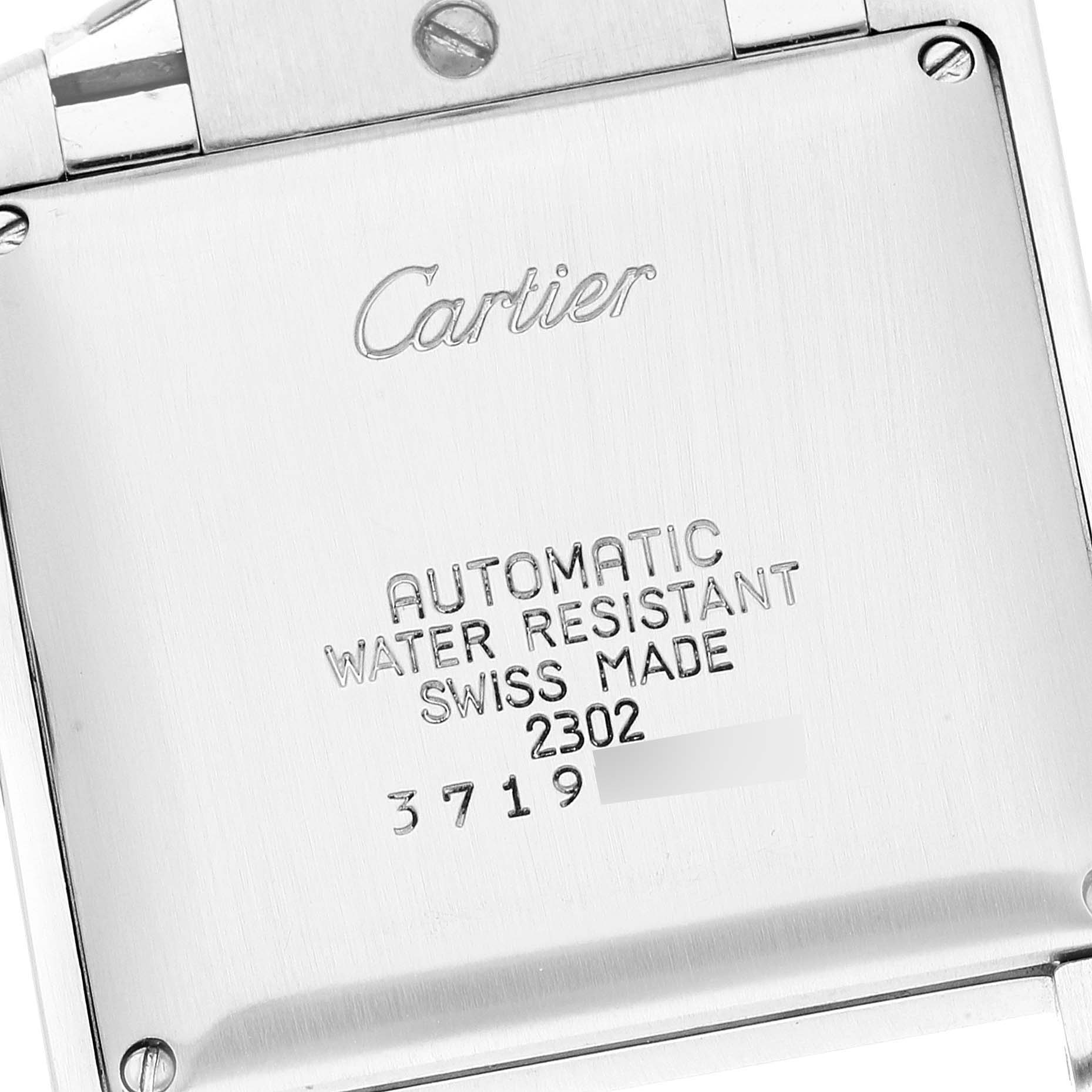 The image shows the back case of a Cartier Tank Francaise W51002Q3 Men's Stainless Steel Silver Dial W51002Q3 Men's Stainless Steel Silver Dial watch, displaying inscriptions and screws.