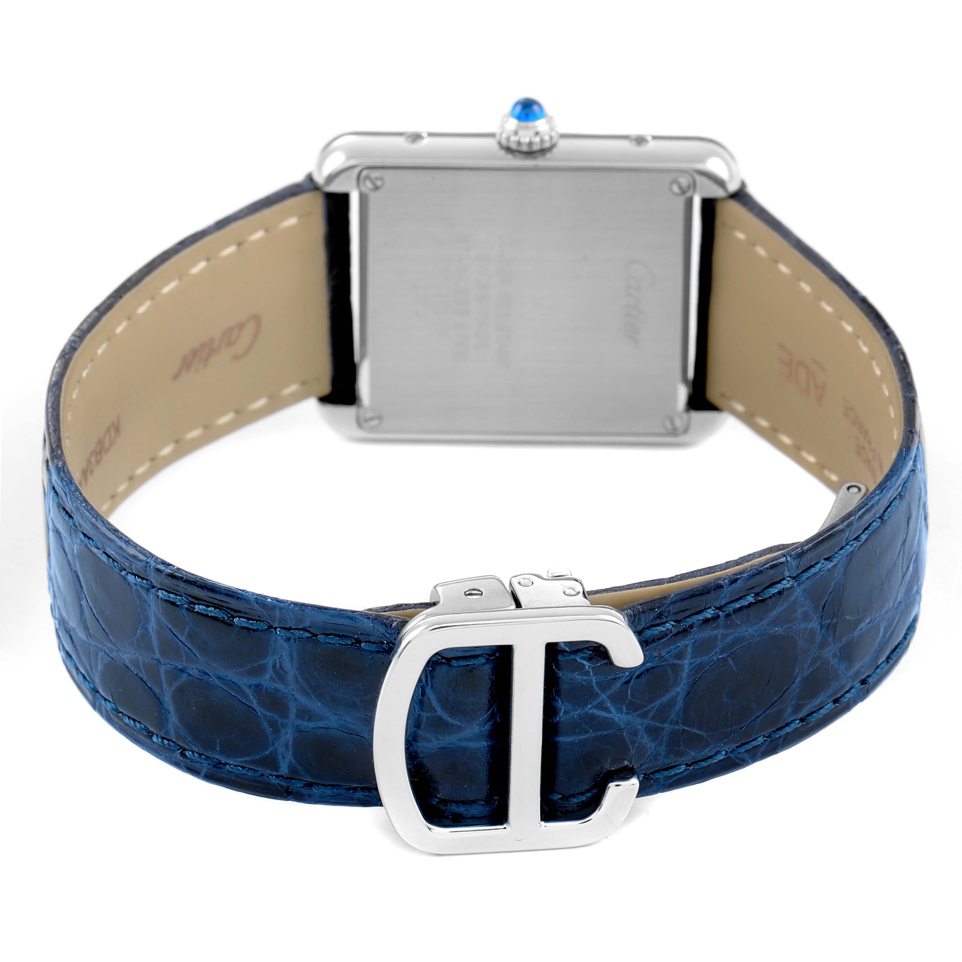 The Cartier Tank Solo WSTA0030 Women's Stainless Steel Silver Dial watch is shown from the back, highlighting its blue strap, buckle, and case back.