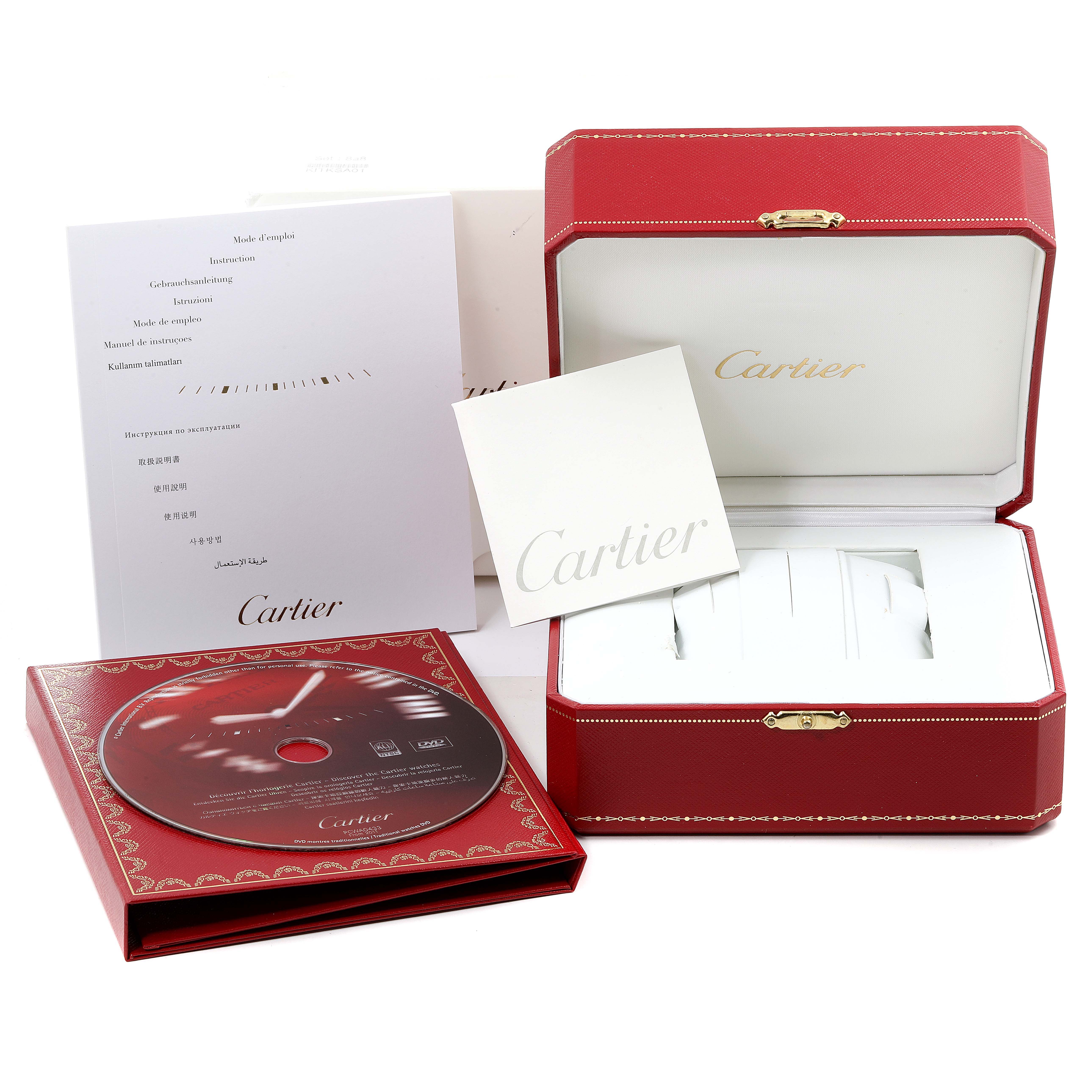 The image shows a Cartier Tank Solo W5200028 Men
s Stainless Steel Silver Dial W5200028 Men
s Stainless Steel Silver Dial watch box, manual, CD, and warranty card from a front angle.