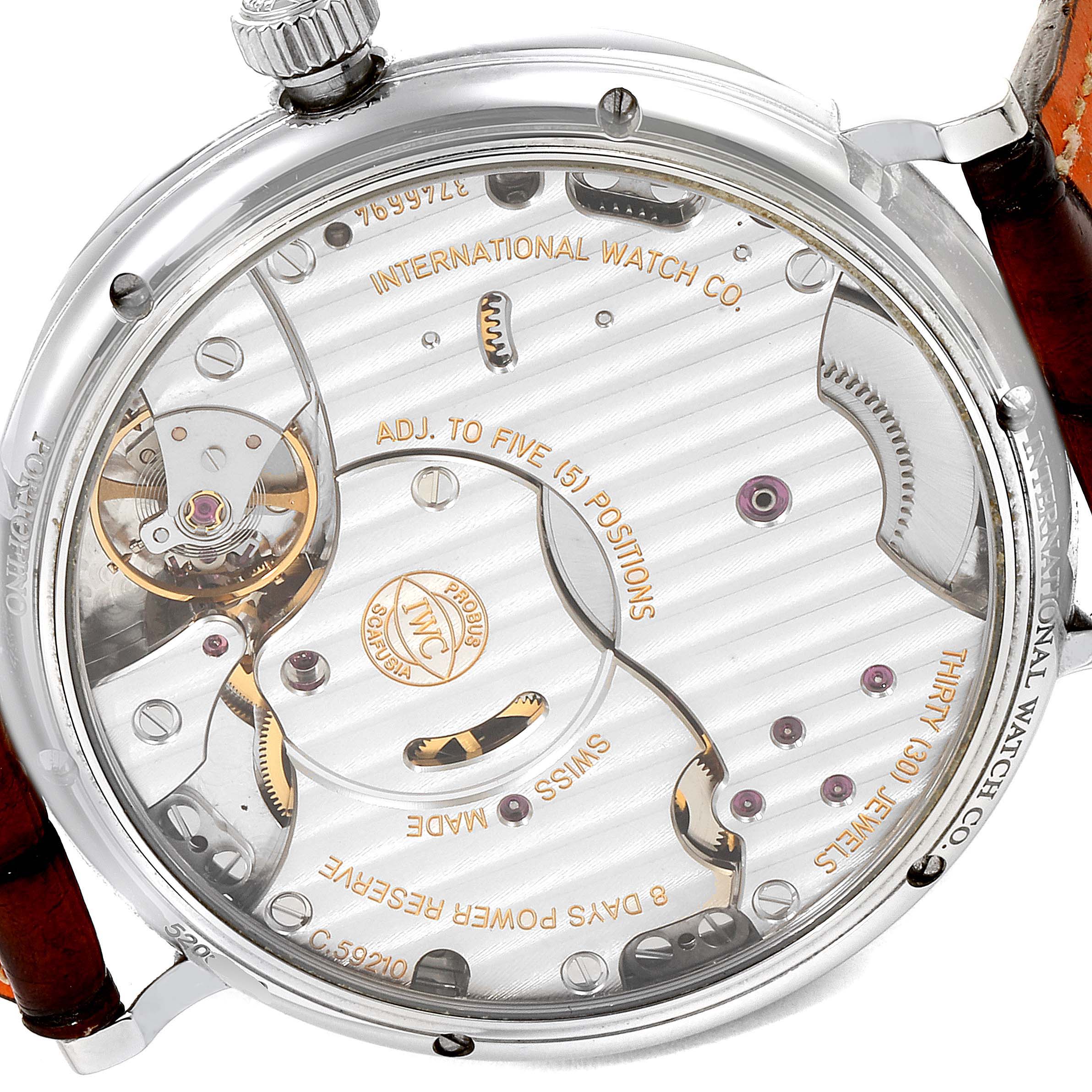 This image shows the rear view of the IWC Portofino IW510103 Men's Stainless Steel Silver Dial IW510103 Men's Stainless Steel Silver Dial watch, highlighting its intricate movement and internal mechanisms.