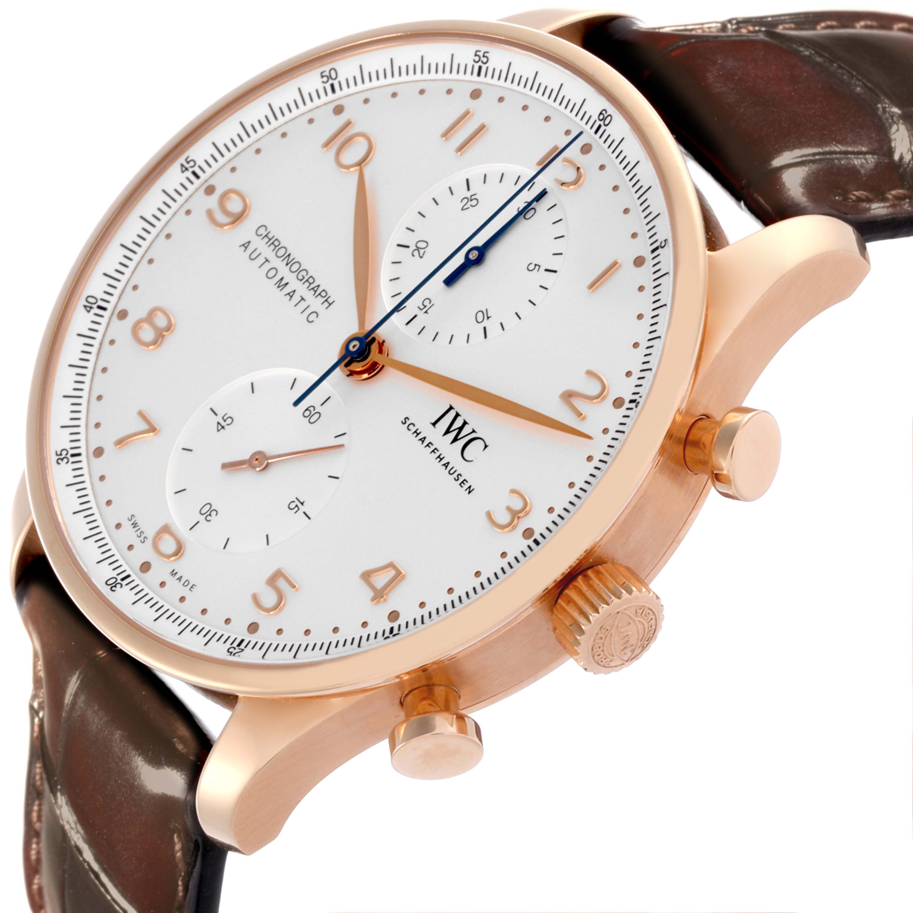 The IWC Portuguese IW371611 Men's Rose Gold Silver Dial IW371611 Men's Rose Gold Silver Dial watch is shown at a three-quarter angle, highlighting the dial, case, crown, and part of the leather strap.