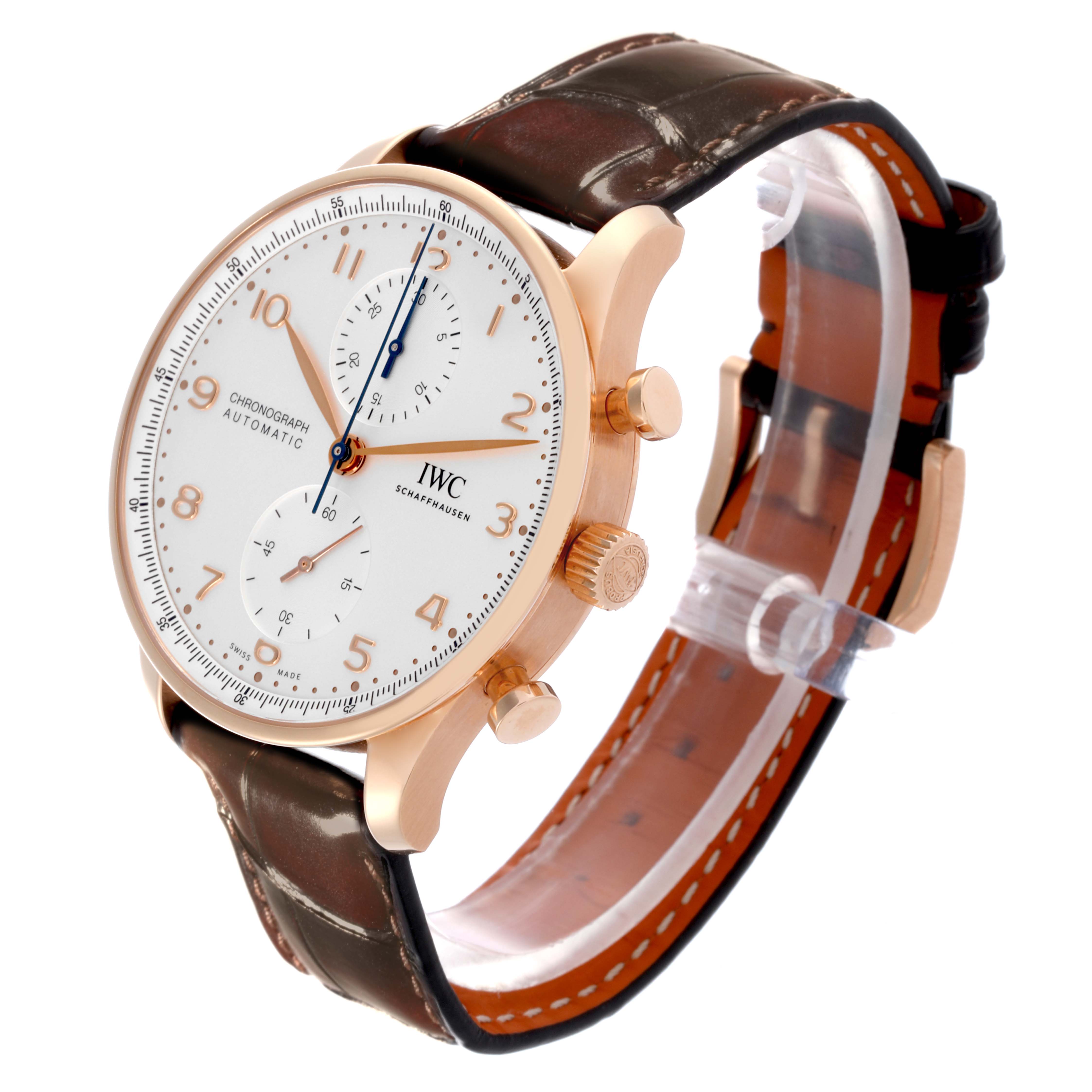 The IWC Portuguese IW371611 Men's Rose Gold Silver Dial IW371611 Men's Rose Gold Silver Dial watch is shown at a three-quarter angle featuring the dial, case, crown, and leather strap.