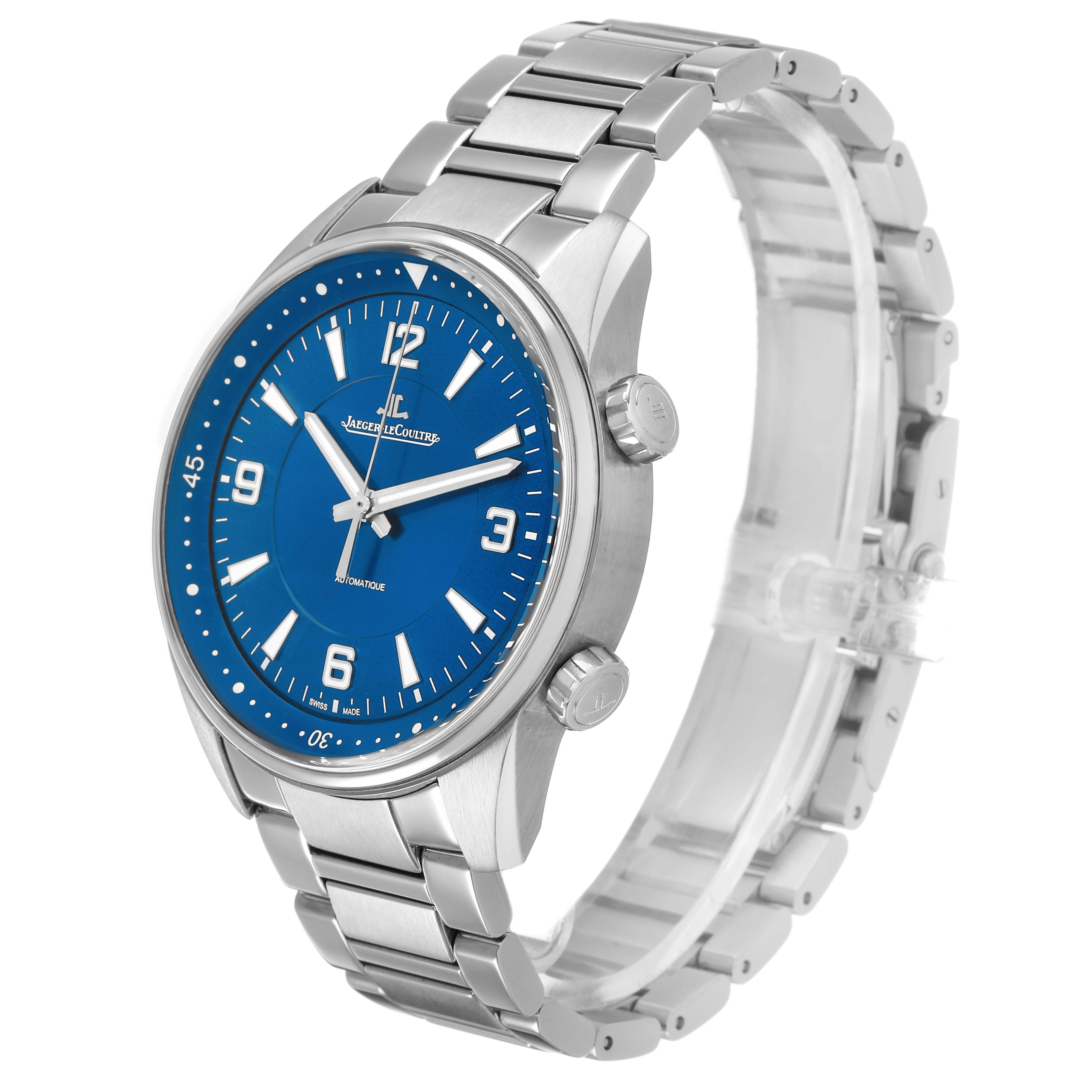 The Jaeger-LeCoultre Polaris watch is shown at a slight angle, highlighting the blue dial, stainless steel bracelet, and dual crowns.