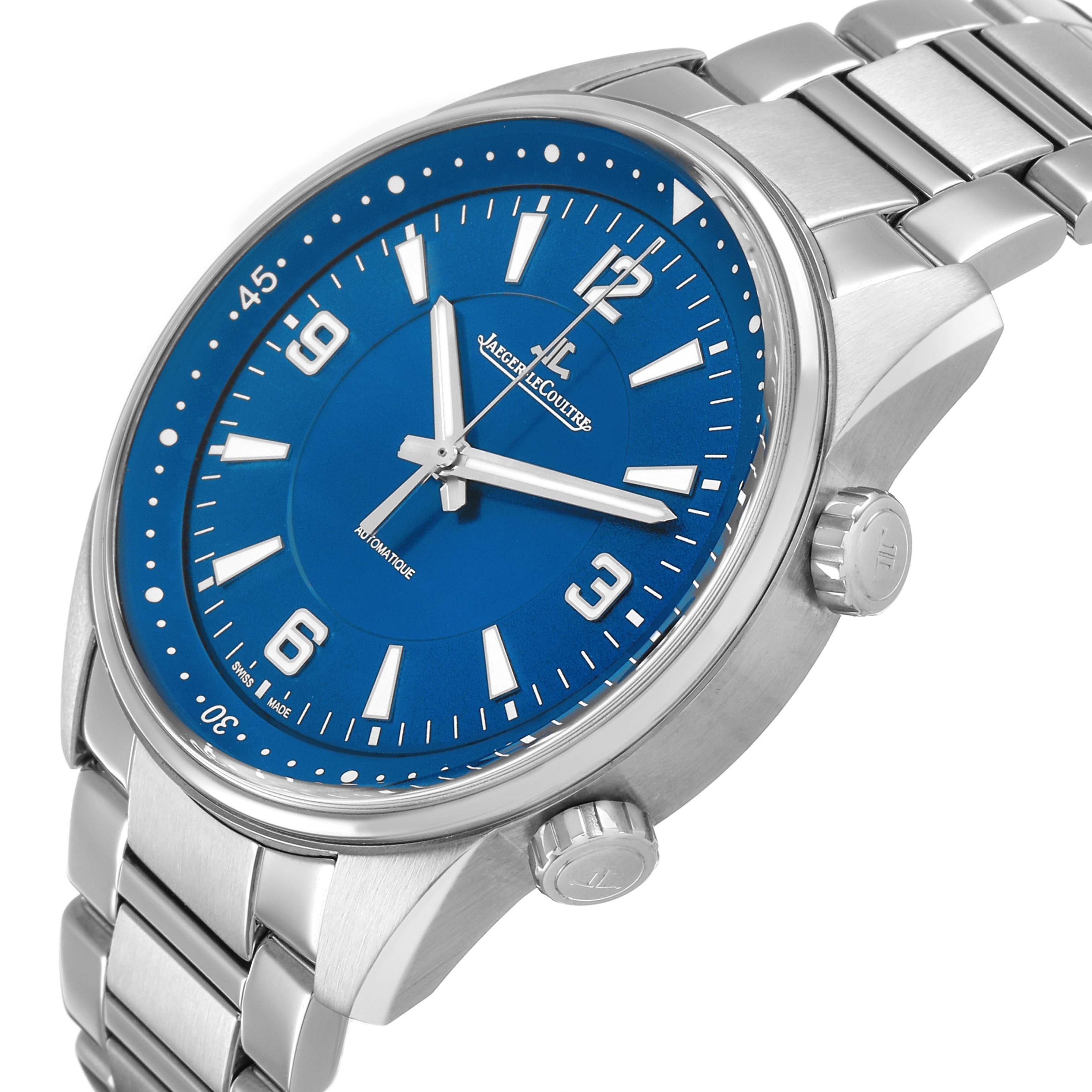 The Jaeger LeCoultre Polaris Q9008180 Men's Stainless Steel Blue Dial watch is shown at an angled side view, highlighting the blue dial, bezel, crown, and bracelet.