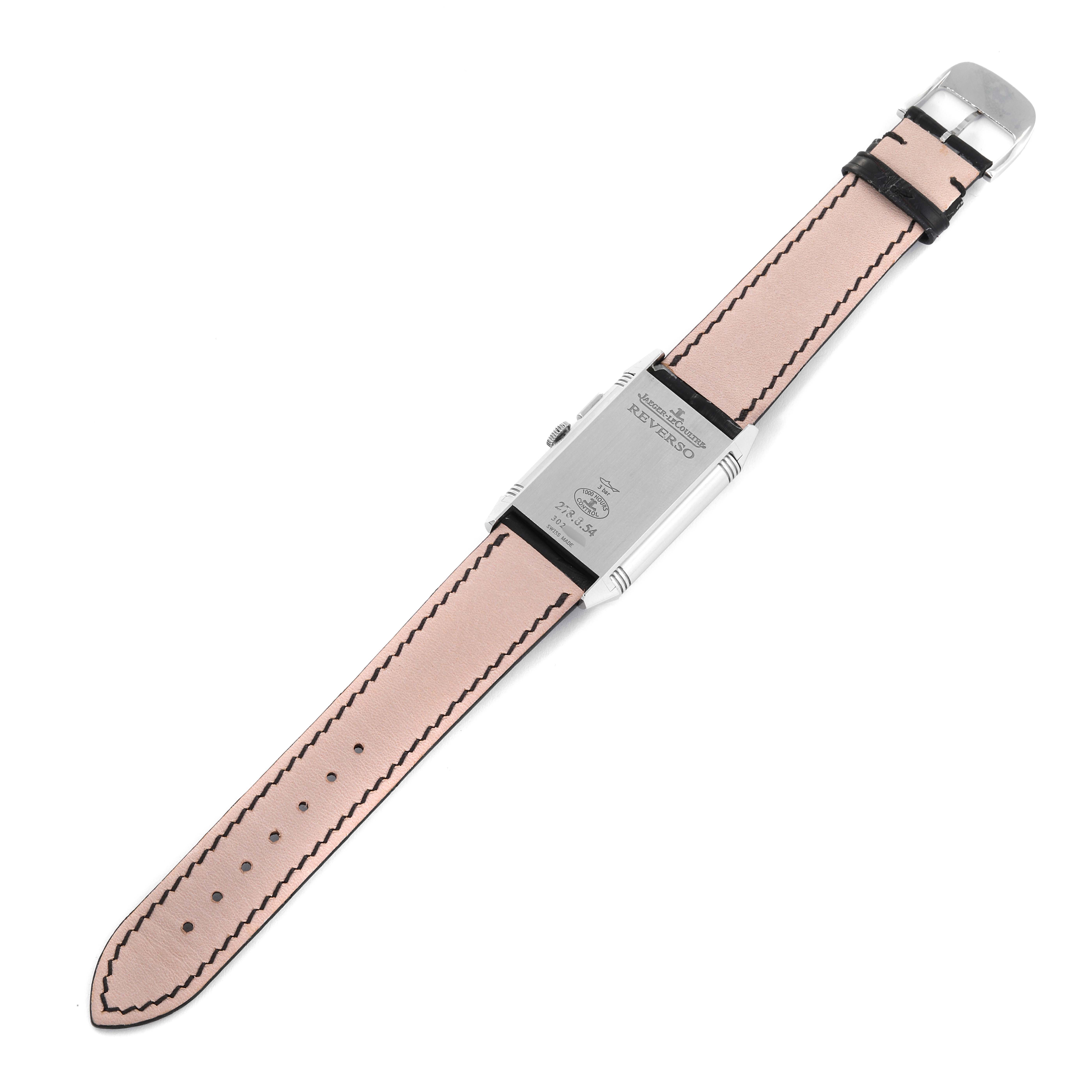 The image shows the back and strap of a Jaeger-LeCoultre Reverso watch laid flat.
