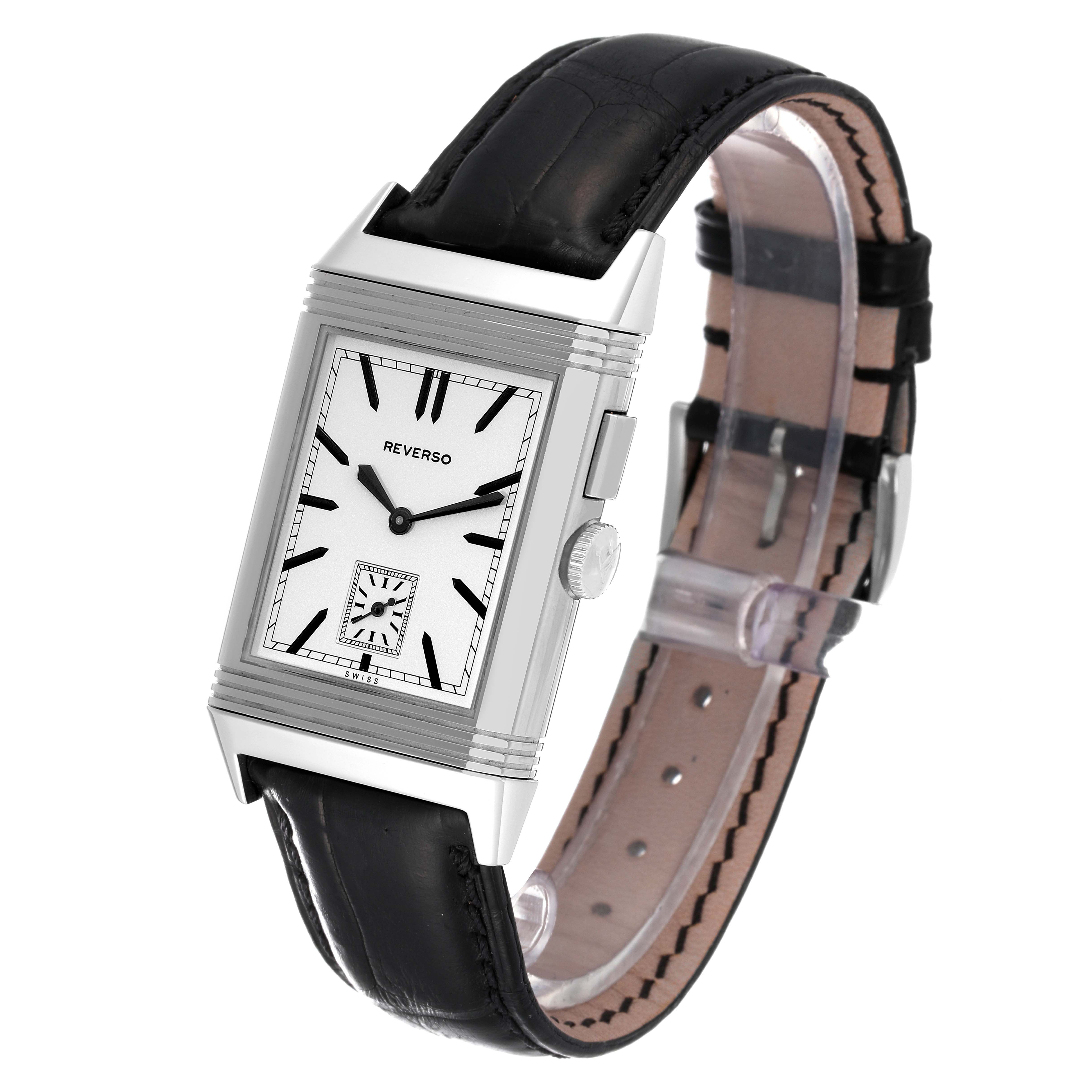 The image shows a Jaeger-LeCoultre Reverso watch at a slight angle, highlighting the rectangular face and black leather strap.