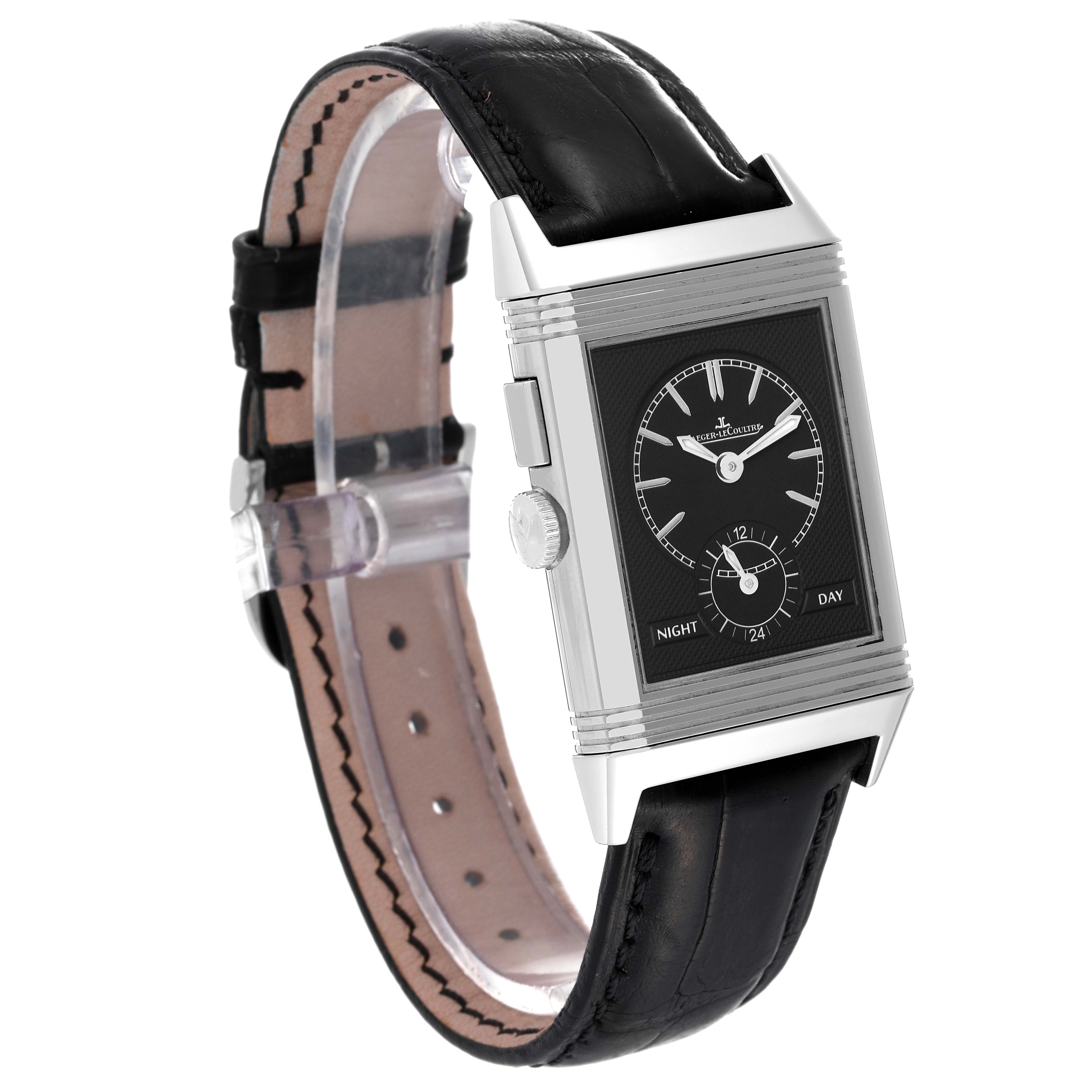 This Jaeger LeCoultre Reverso Q3788570 Men
s Stainless Steel Silver Dial Q3788570 Men
s Stainless Steel Silver Dial watch is shown at an angle displaying its face, crown, leather strap, and stainless steel case.