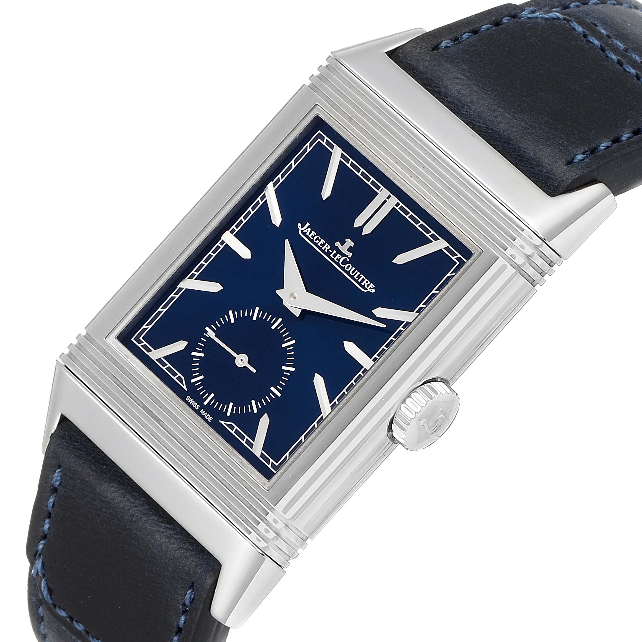The image shows a close-up of the Jaeger-LeCoultre Reverso watch featuring its dial, crown, and part of the strap.