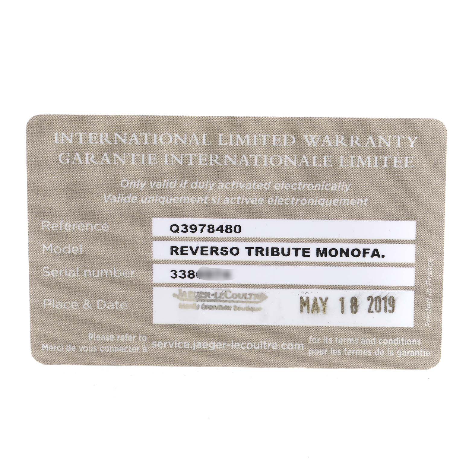 This image shows the international limited warranty card for the Jaeger-LeCoultre Reverso Tribute Monoface, with reference and serial number details.
