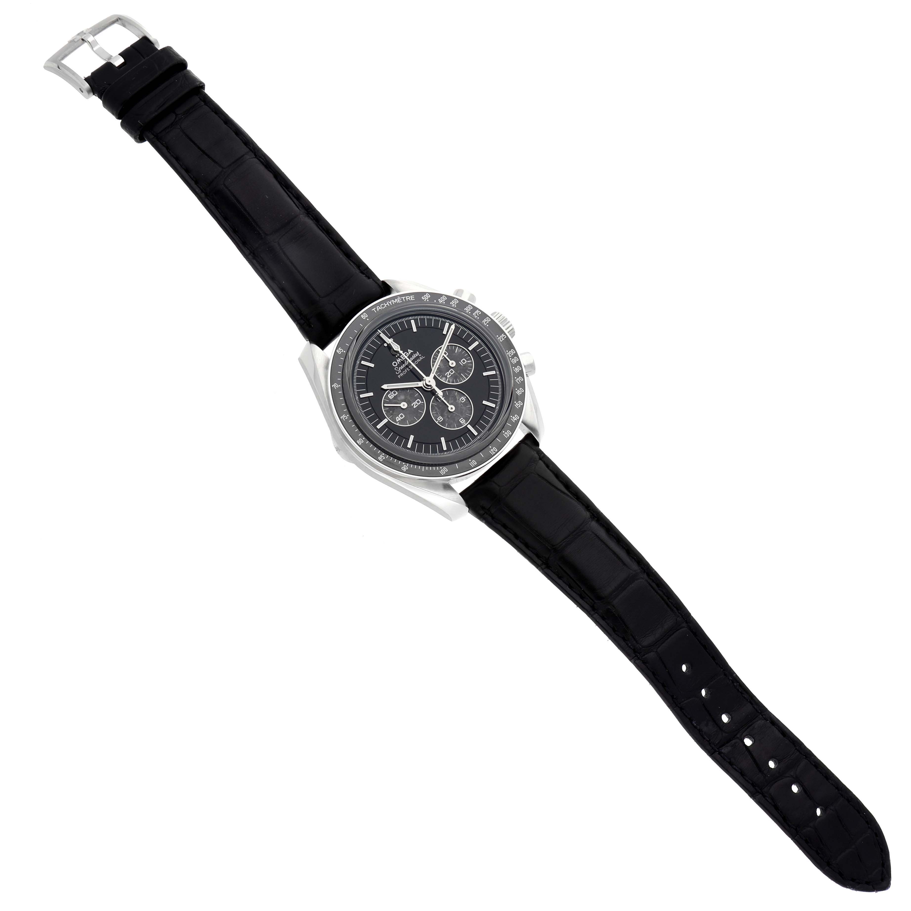 The Omega Speedmaster 311.93.42.30.99.001 Men's Platinum Black Dial 311.93.42.30.99.001 Men's Platinum Black Dial watch is shown from a top-down angle, displaying the face, bezel, case, and black leather strap.