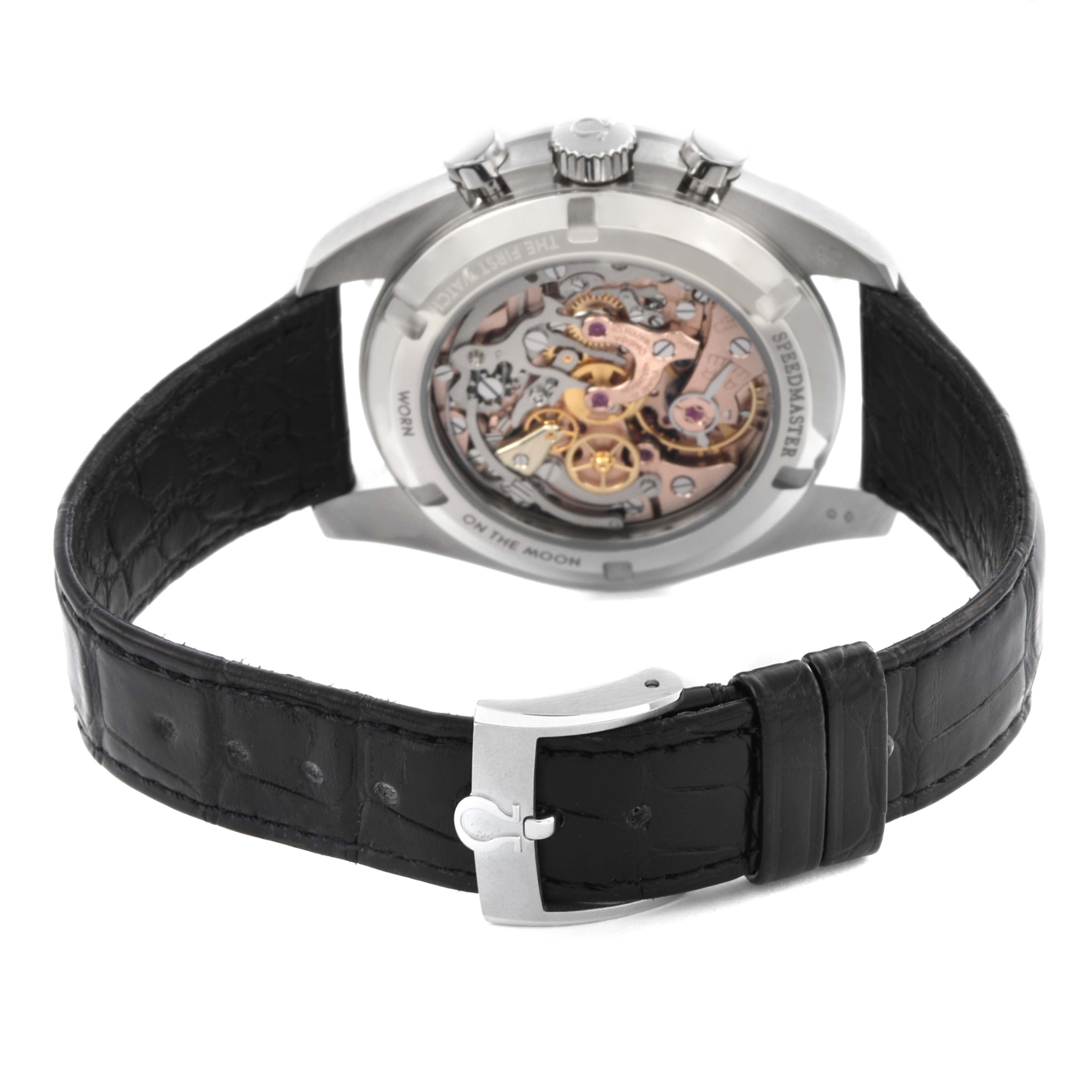 The Omega Speedmaster 311.93.42.30.99.001 Men's Platinum Black Dial 311.93.42.30.99.001 Men's Platinum Black Dial watch is shown from the back, displaying its open caseback and movement, with a black leather strap.