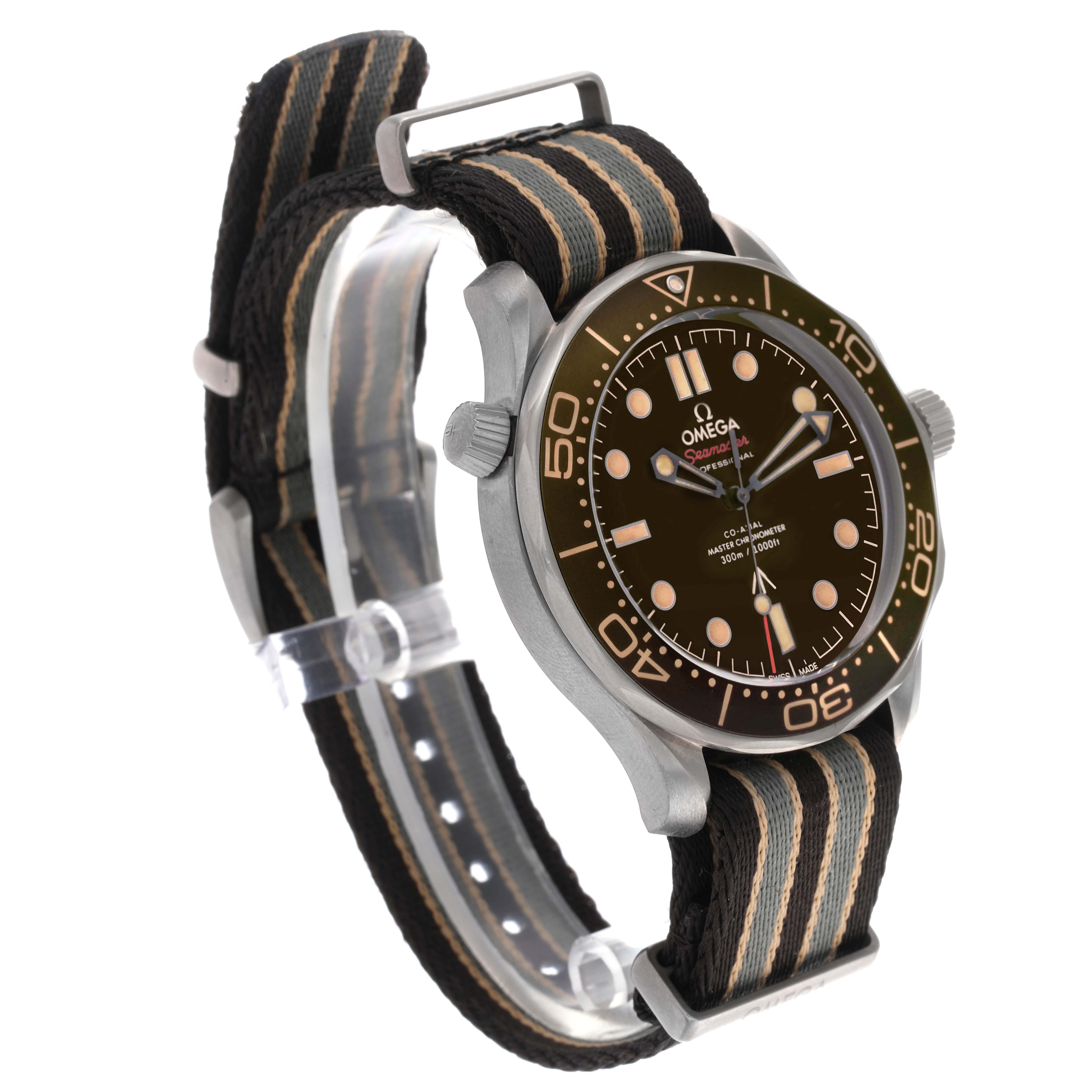 The Omega Seamaster 210.92.42.20.01.001 Men's Titanium Brown Dial 210.92.42.20.01.001 Men's Titanium Brown Dial watch is shown at a side angle, highlighting the dial, bezel, and striped fabric strap.