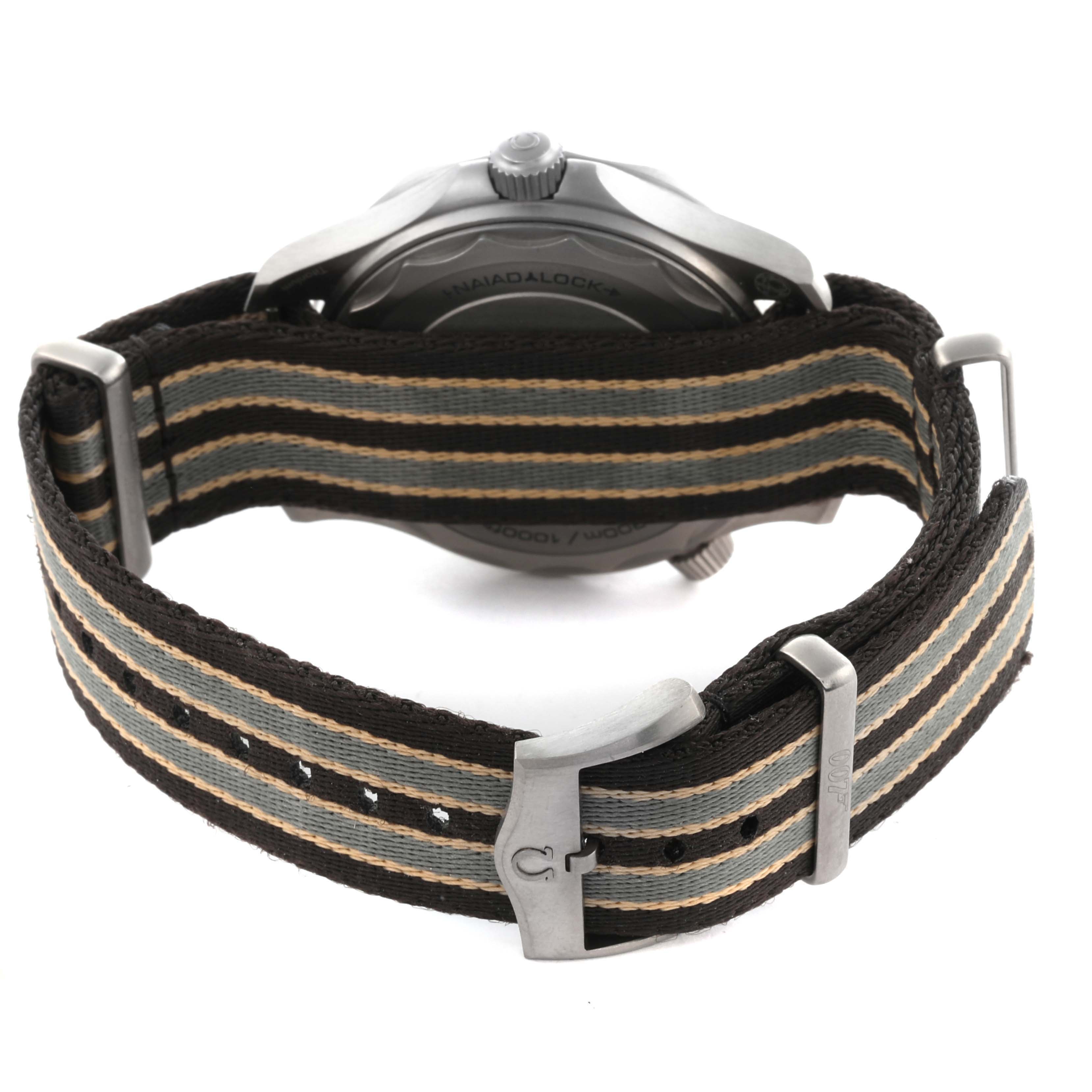 The image shows the back case and NATO strap of an Omega Seamaster 210.92.42.20.01.001 Men's Titanium Brown Dial 210.92.42.20.01.001 Men's Titanium Brown Dial watch at a rear angle.