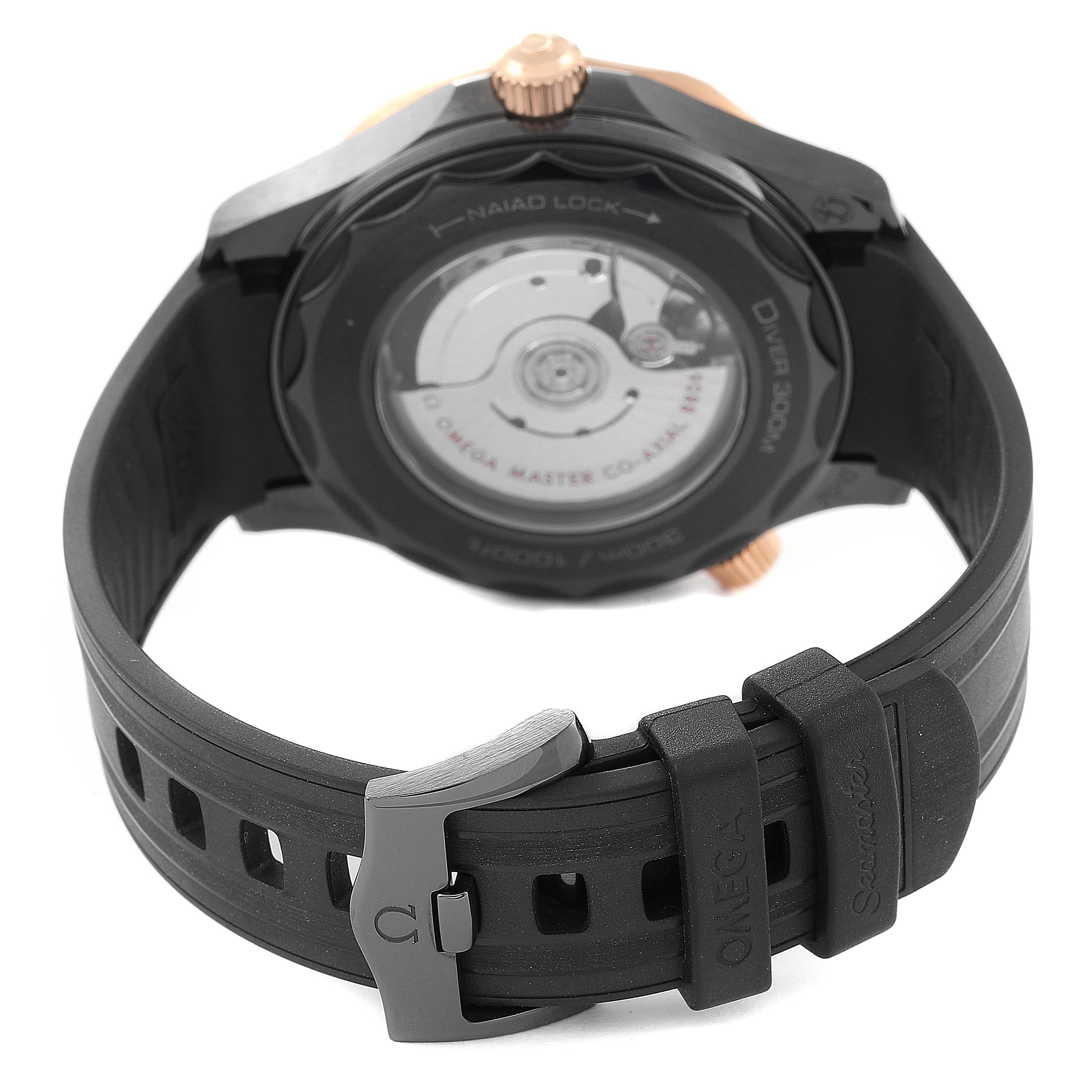 The image shows the back view of an Omega Seamaster 210.62.44.20.01.00 Men's Ceramic Black Dial 210.62.44.20.01.00 Men's Ceramic Black Dial watch, highlighting the strap, buckle, and transparent case back.