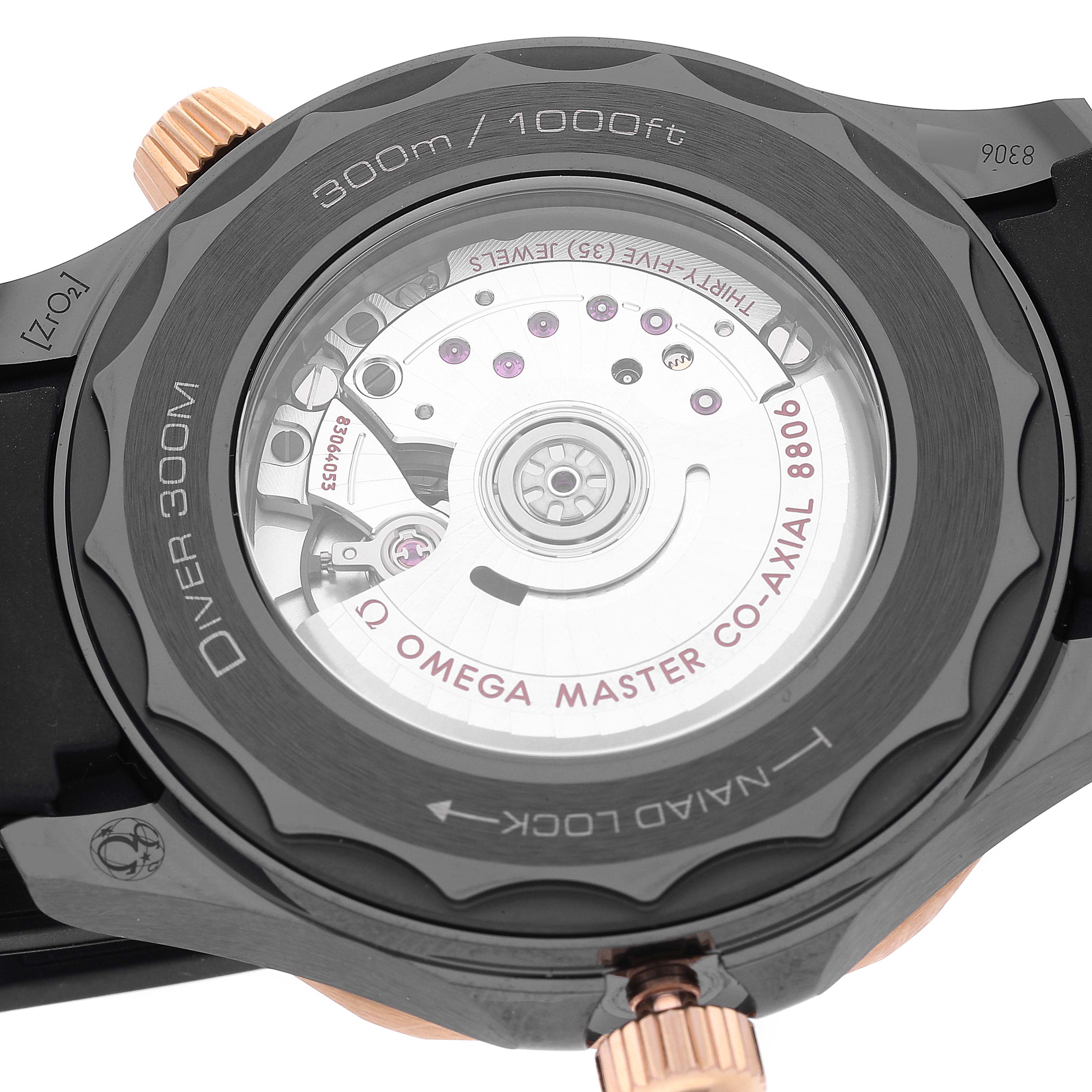The image shows the back of the Omega Seamaster 210.62.44.20.01.00 Men's Ceramic Black Dial 210.62.44.20.01.00 Men's Ceramic Black Dial diving watch, highlighting the movement and water resistance details.
