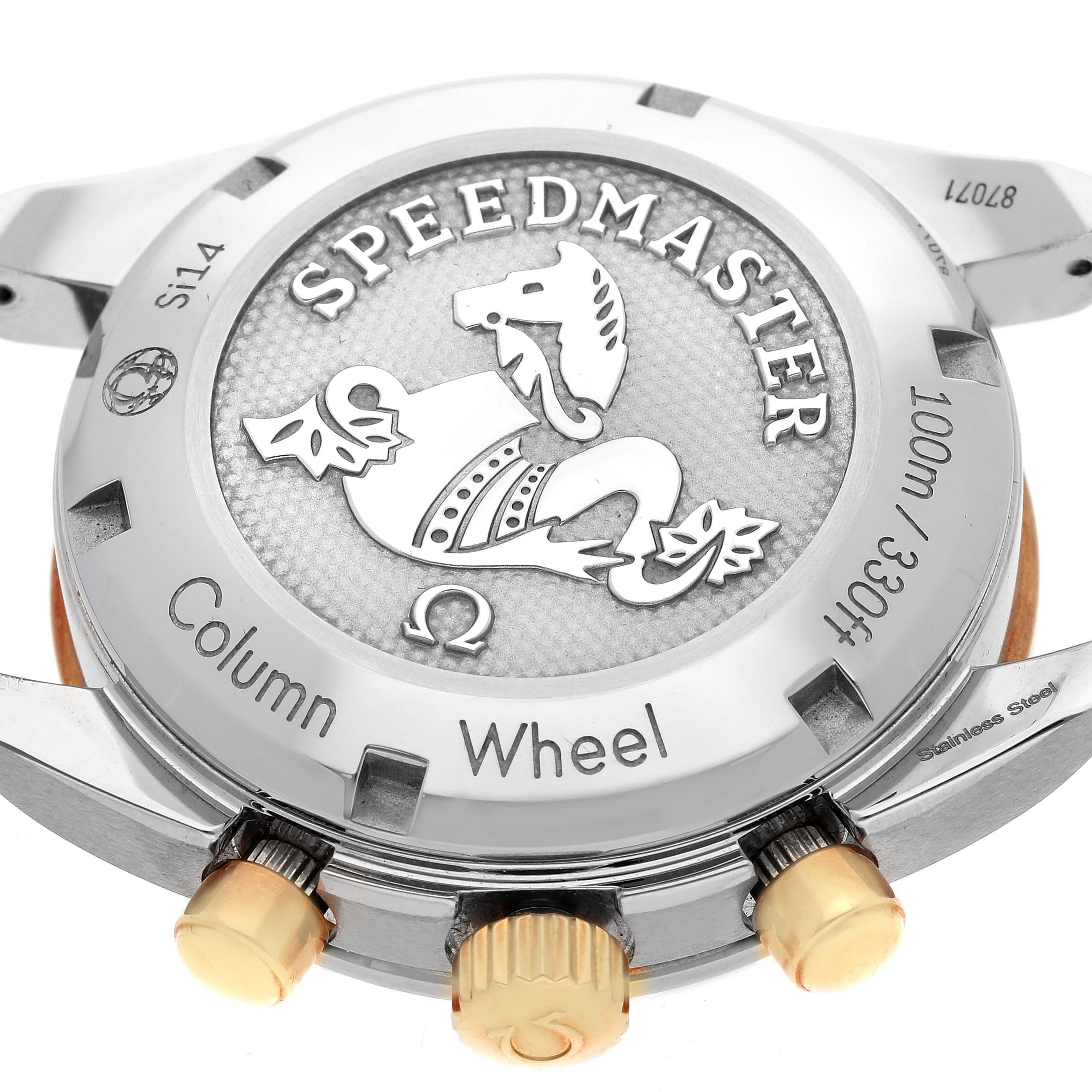 The image shows the back of an Omega Speedmaster 324.23.38.50.02.001 Men's Steel and Gold (two tone) Silver Dial 324.23.38.50.02.001 Men's Steel and Gold (two tone) Silver Dial watch, highlighting the case back and pushers.