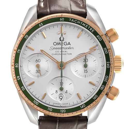 The Omega Speedmaster watch is shown from the front, displaying its dial, tachymeter bezel, and pushers clearly.